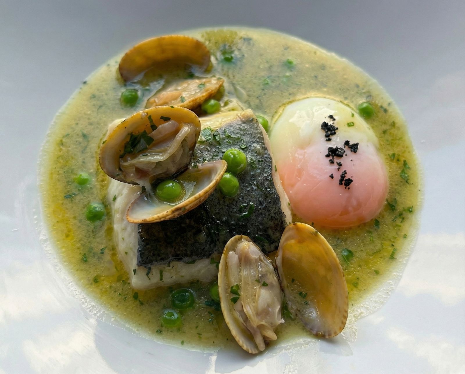 Merluza de pintxo en salsa verde.