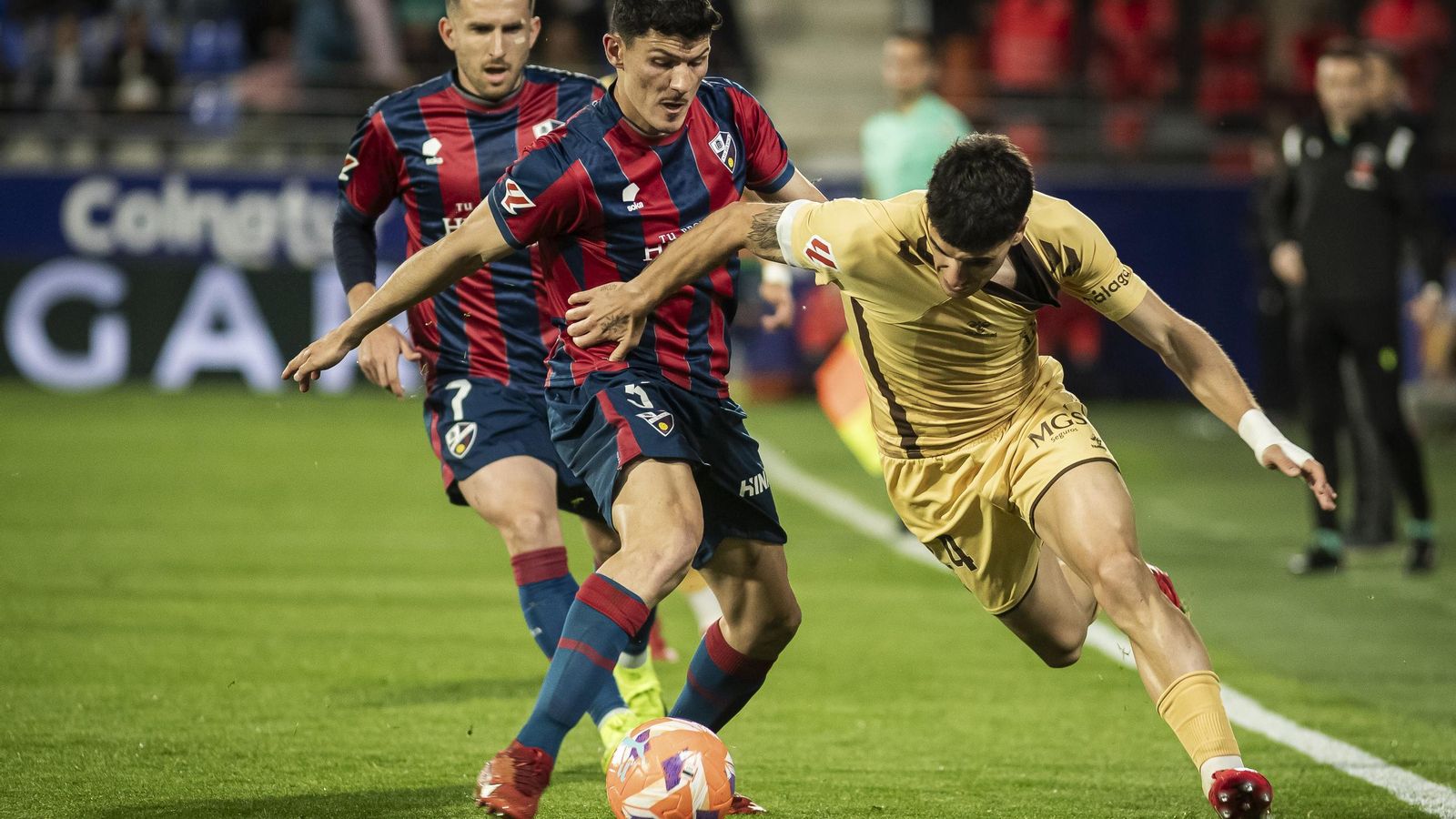 El Huesca-Málaga CF, en fotos