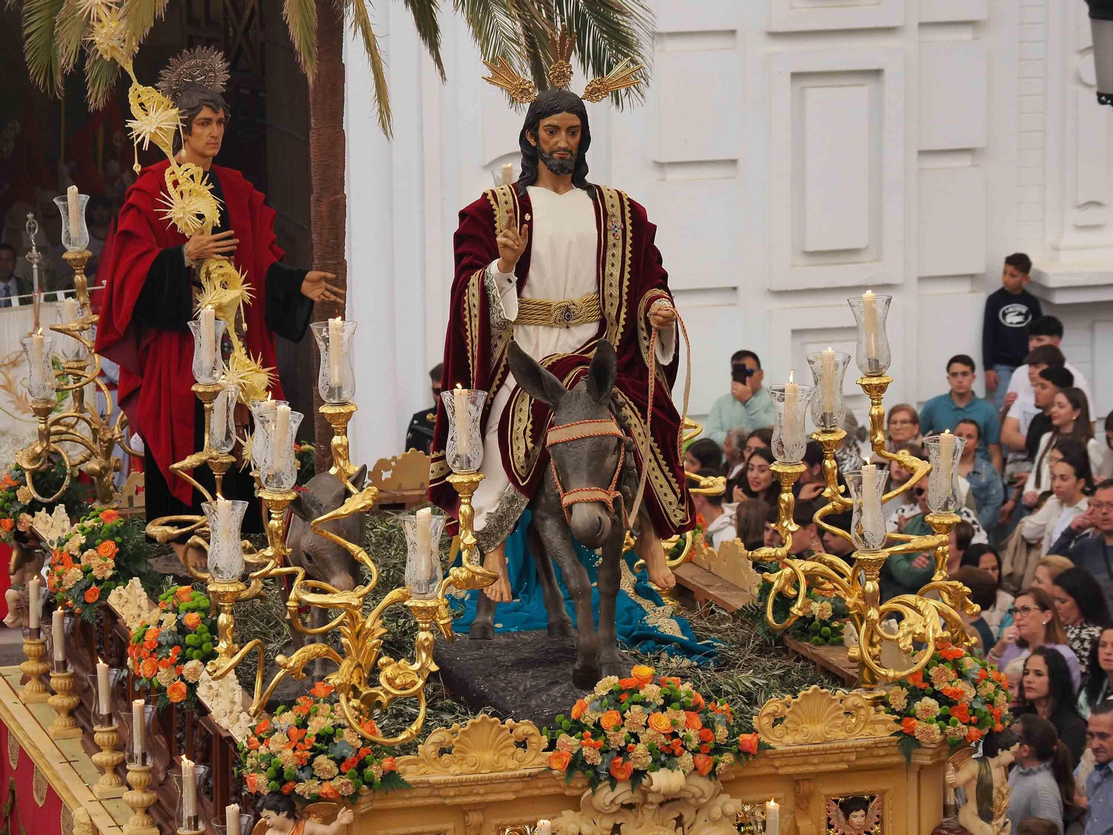 Las mejores imágenes de 'La Mulita' en Isla Cristina, única procesión en la tarde del Domingo de Ramos en la costa onubense