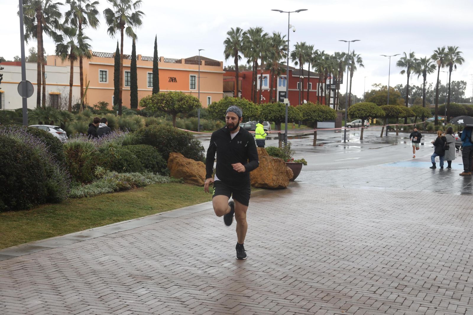 La Carrera por el Día Internacional de la Mujer en Málaga, en fotos