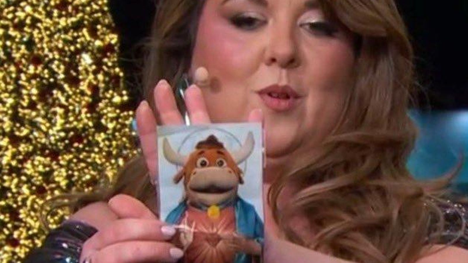 Lalachus con su estampita del 'Grand Prix' del Sagrado Corazón