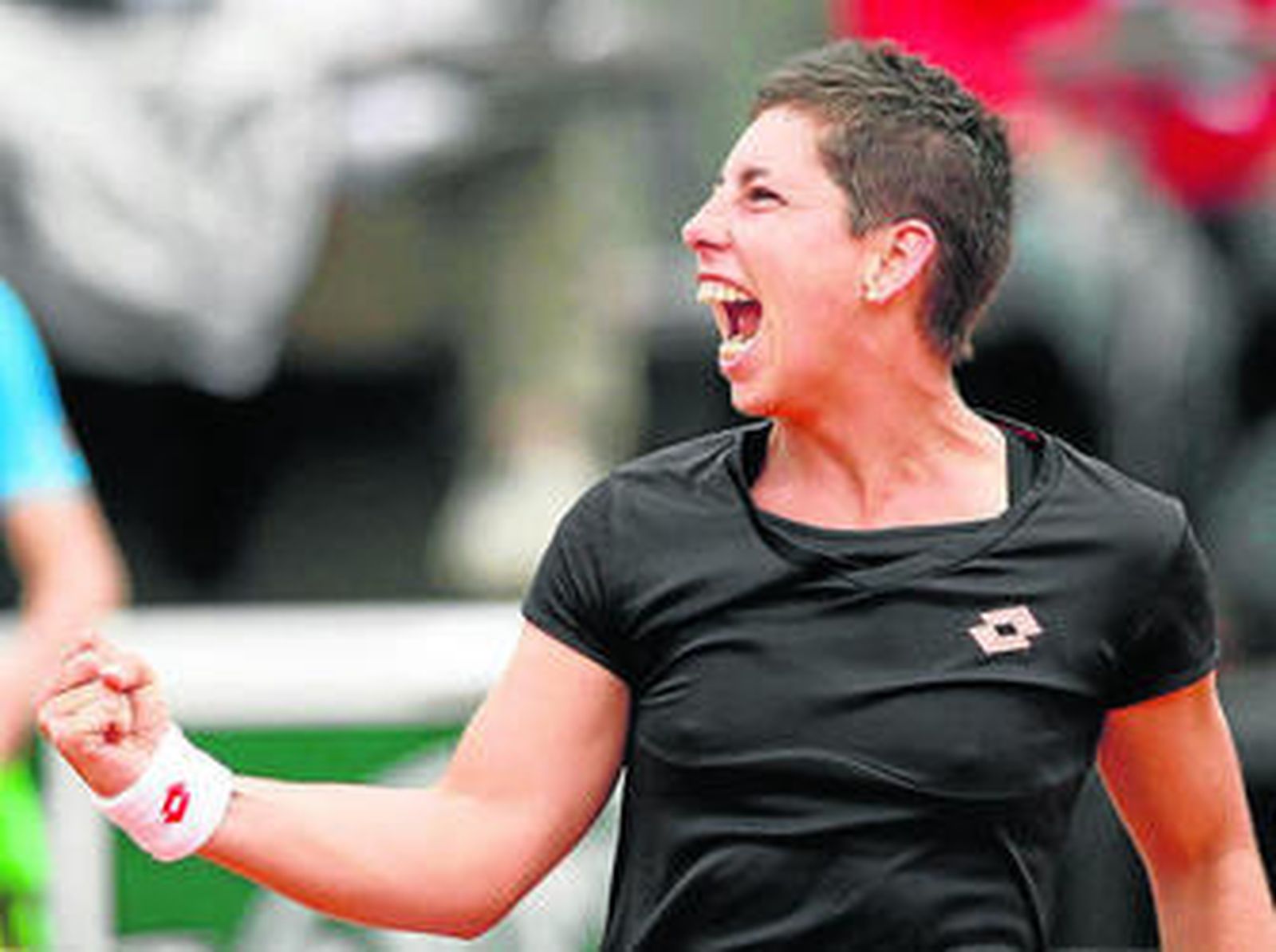 Carla Suárez hace un gesto de rabia tras vencer su encuentro.