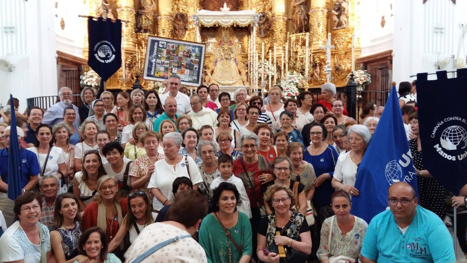 Representación de integrantes de Manos Unidas en El Rocío