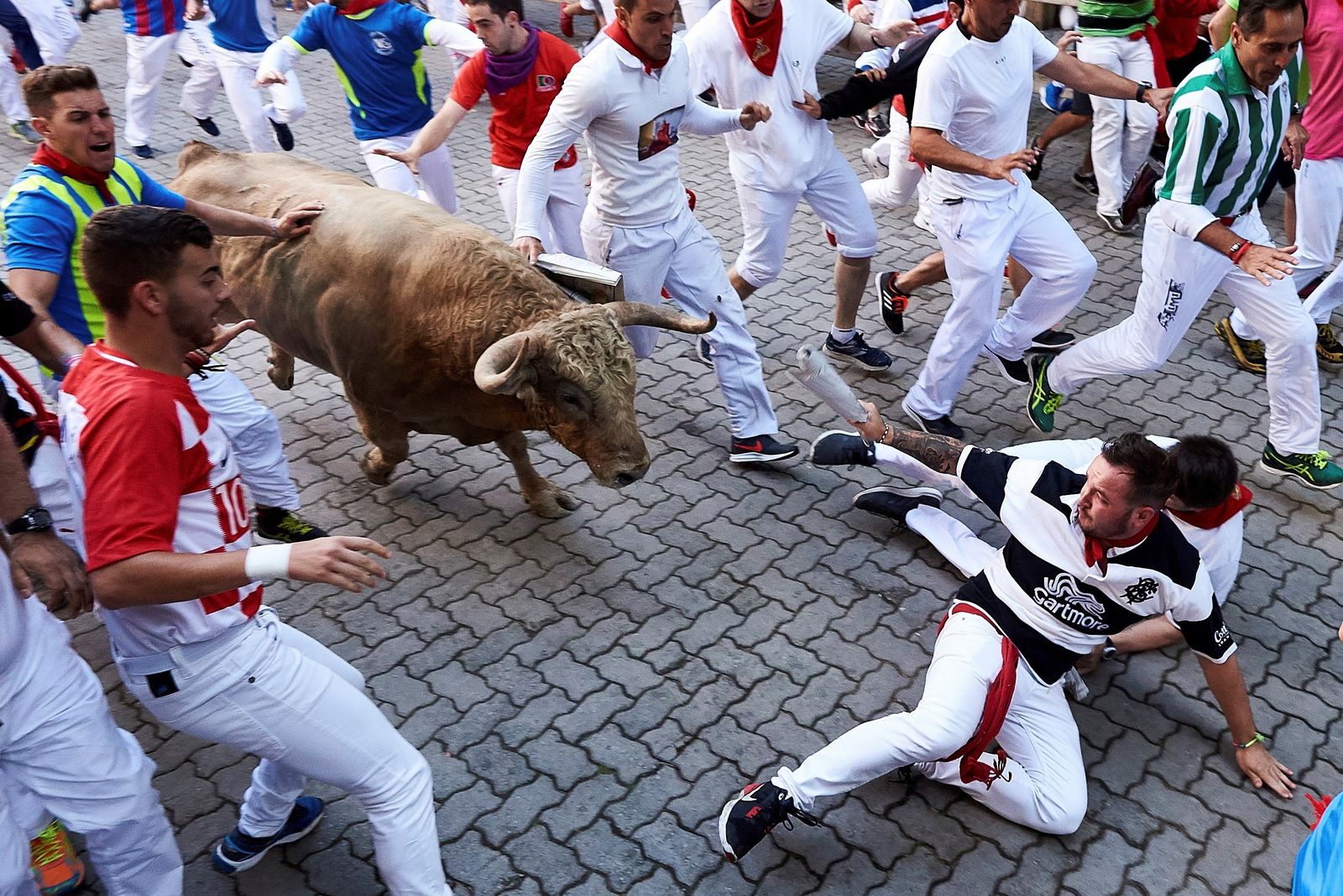 El quinto encierro de los Sanfermines, en imágenes