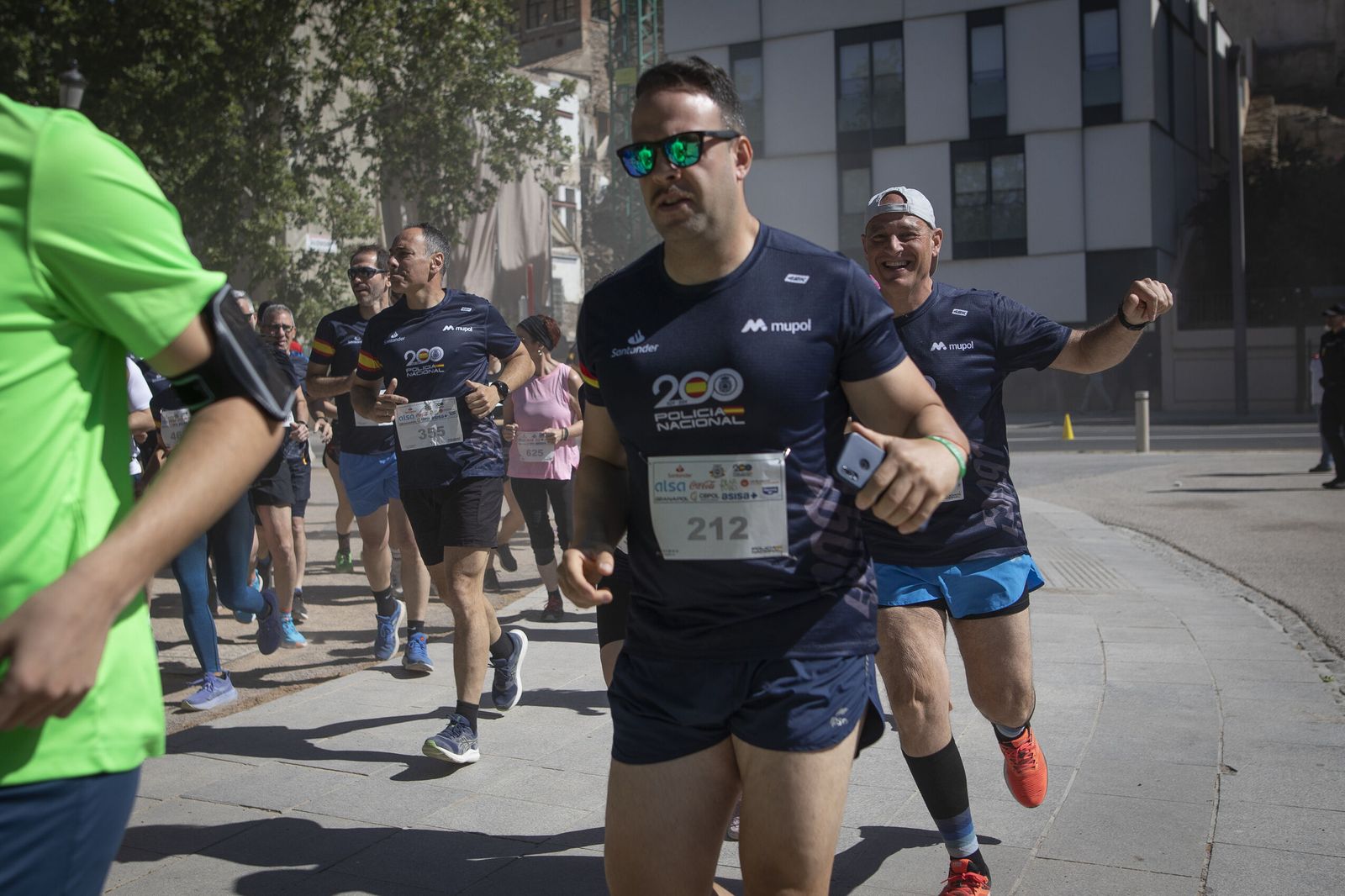 Encuéntrate en las imágenes de la carrera de la Policía Nacional 'Ruta 091'