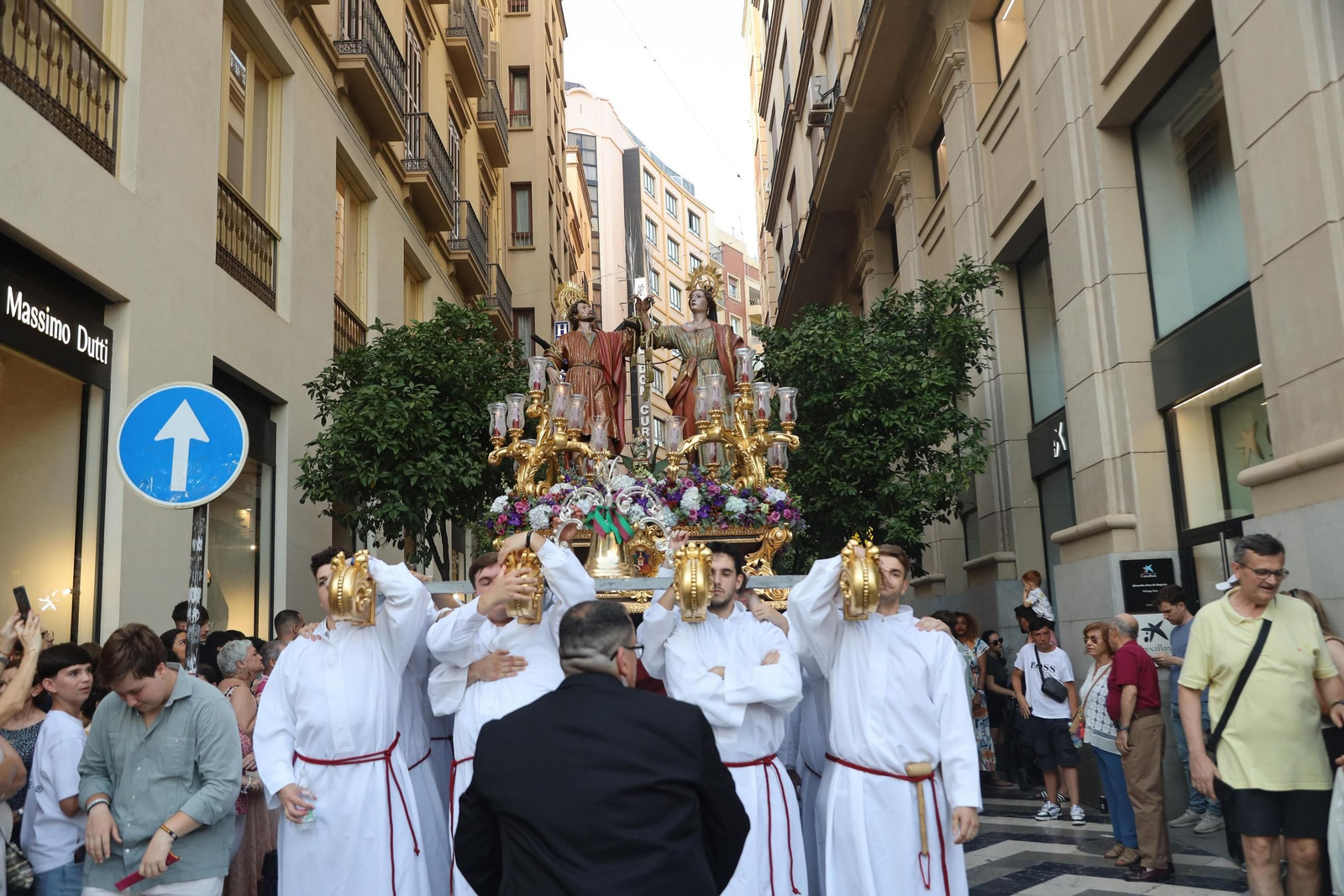 La procesión de los Santos Patronos de Málaga, en fotos