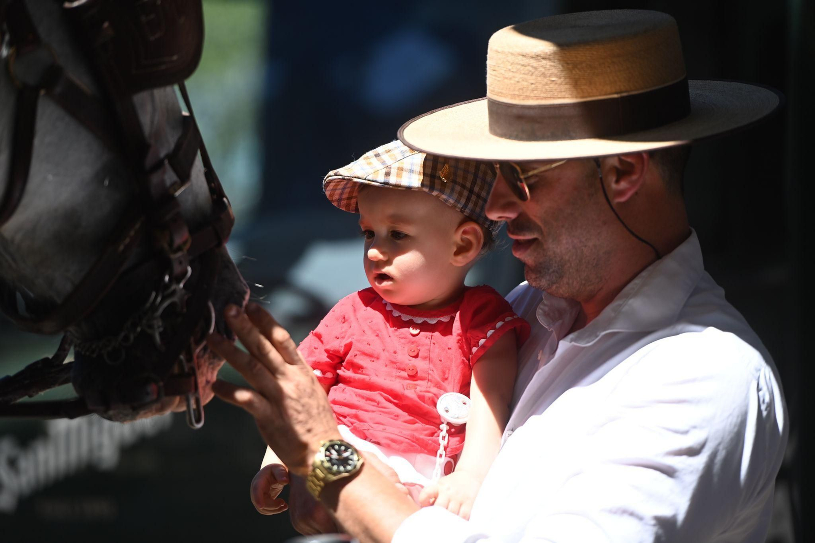 Las fotos del lunes festivo en la Feria en Málaga