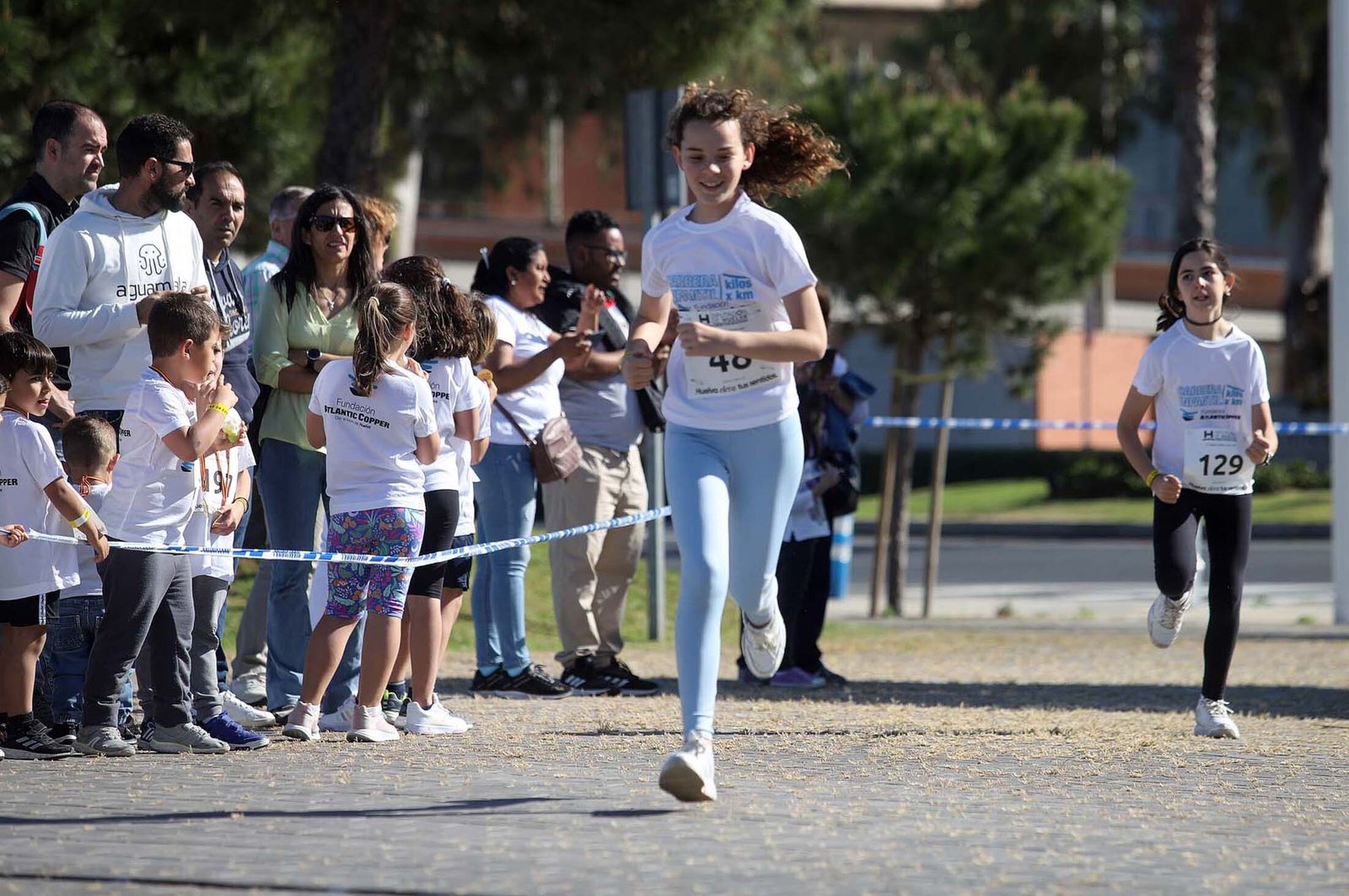 Imágenes de la carrera infantil previa a la "10K Puerta del Descubrimiento"