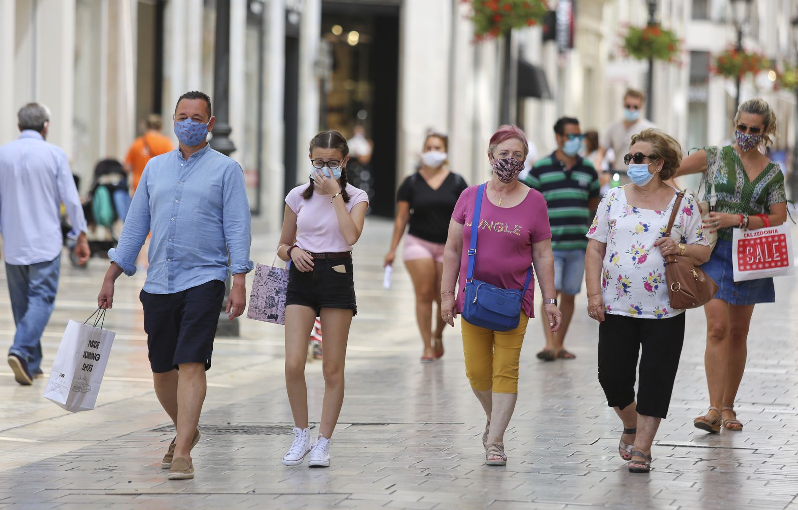 Fotos del primer día de mascarillas obligatorias en las playas y el Centro de Málaga