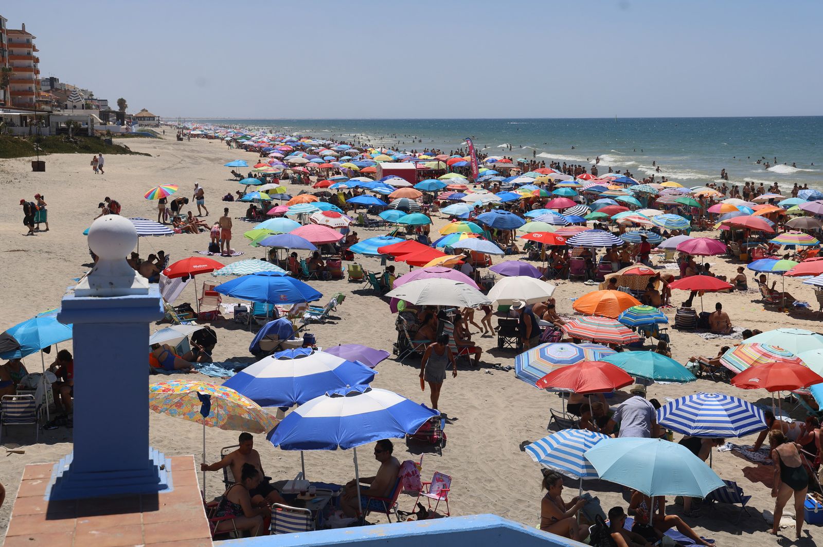 Imágenes de una mañana de calor y playa en Matalascañas