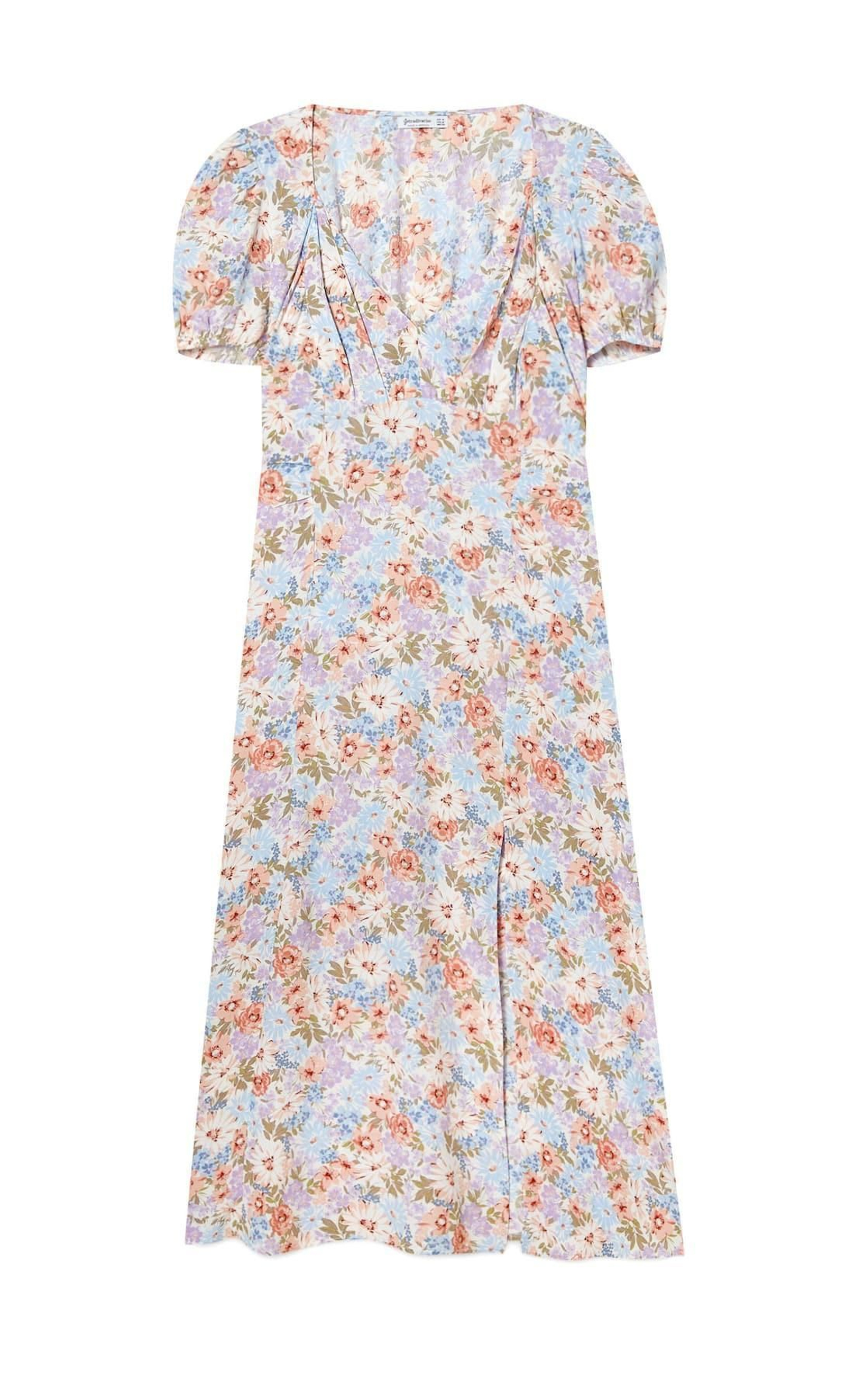 Vestido de flores con mangas abullonadas de Stradivarius. Vestido de flores con mangas abullonadas de Stradivarius.