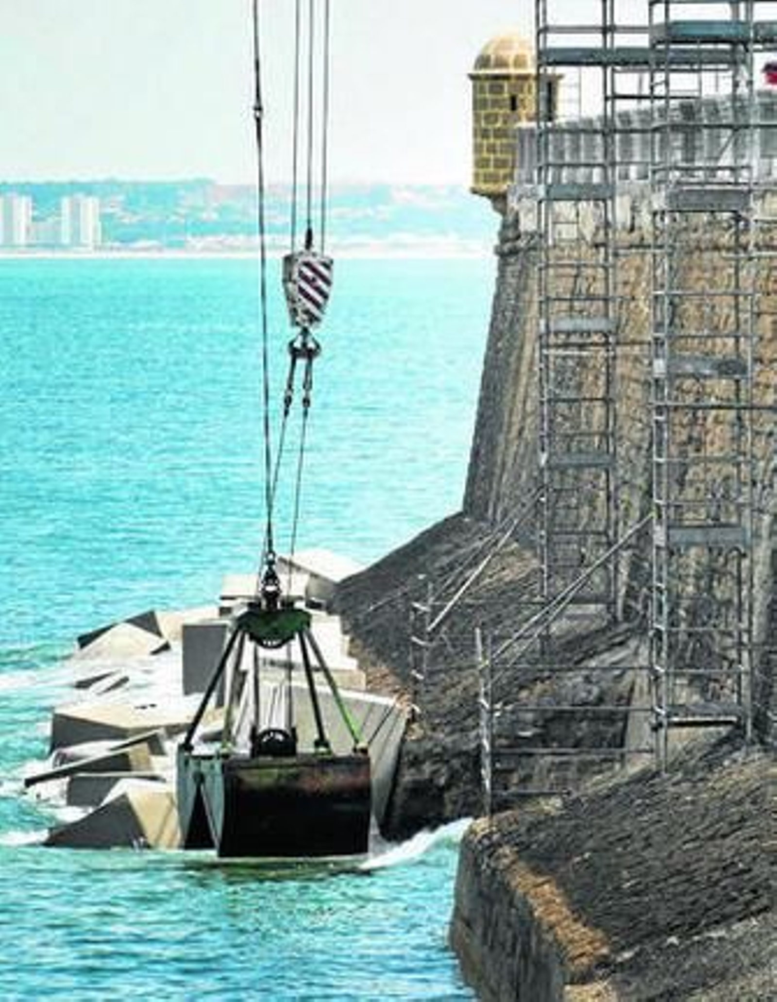 Proceso de instalación de los bloques, ocultando las zapatas.
