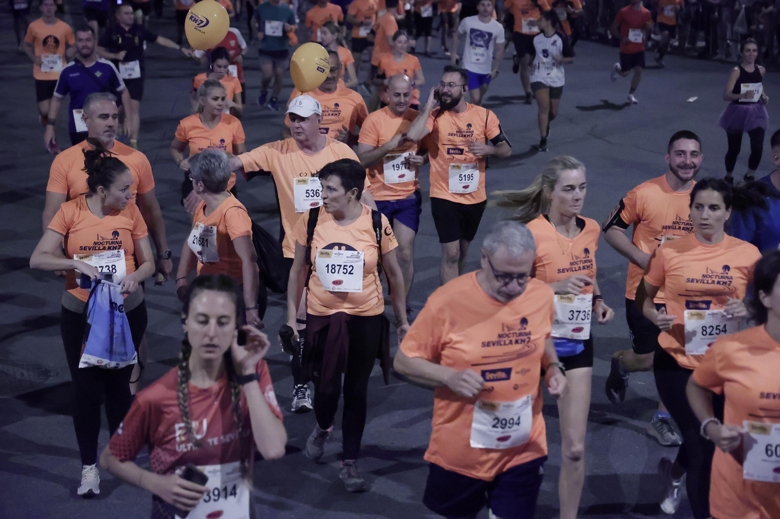 Búscate en la Carrera Nocturna de Sevilla (2)