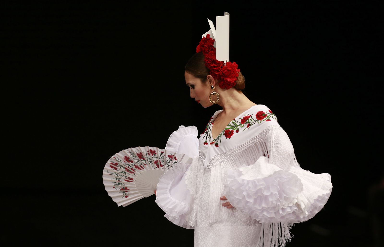 Desfile de Luis Fernández.
