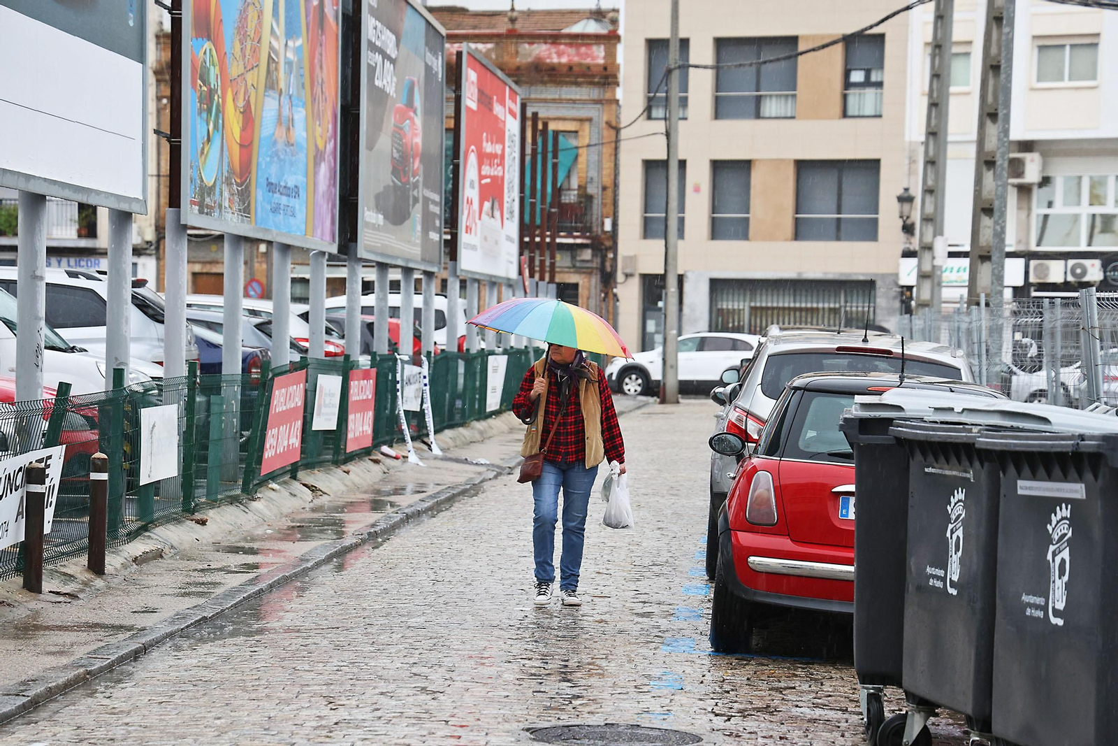 Imágenes de la lluviosa mañana de sábado en Huelva