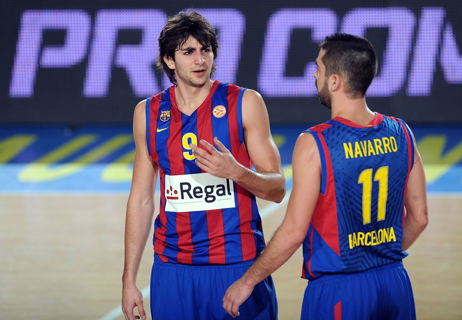 Ricky y Navarro durante un partido con el Barcelona.