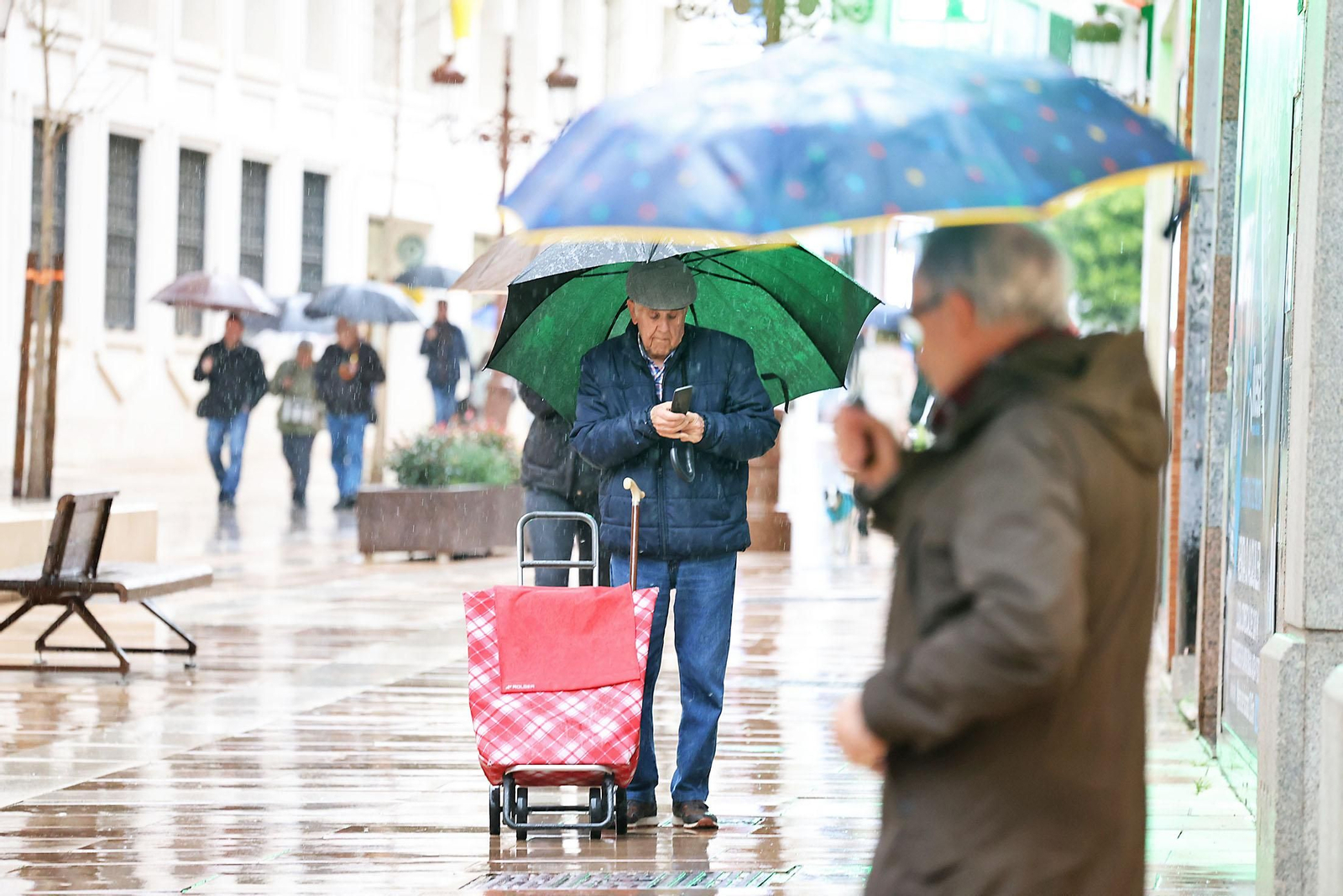 Las imágenes de la lluviosa mañana del jueves 13 de marzo en Huelva