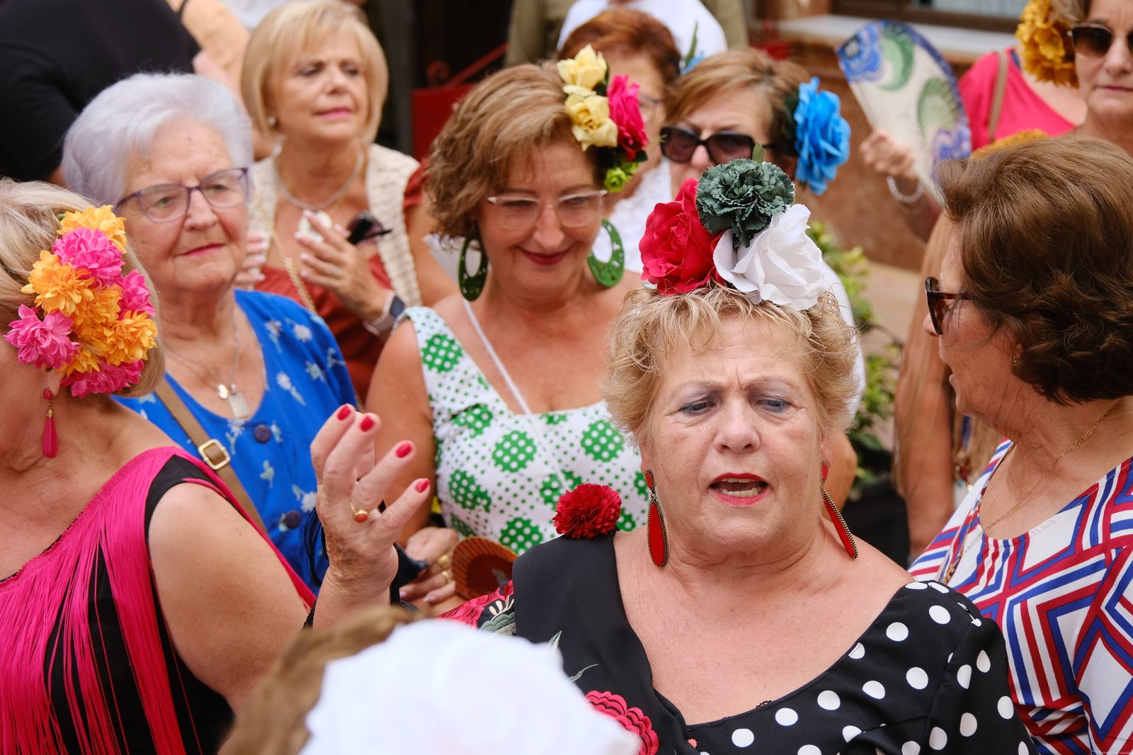 La celebración en Cabra del Día de la Mujer con motivo de la Real Feria, en imágenes