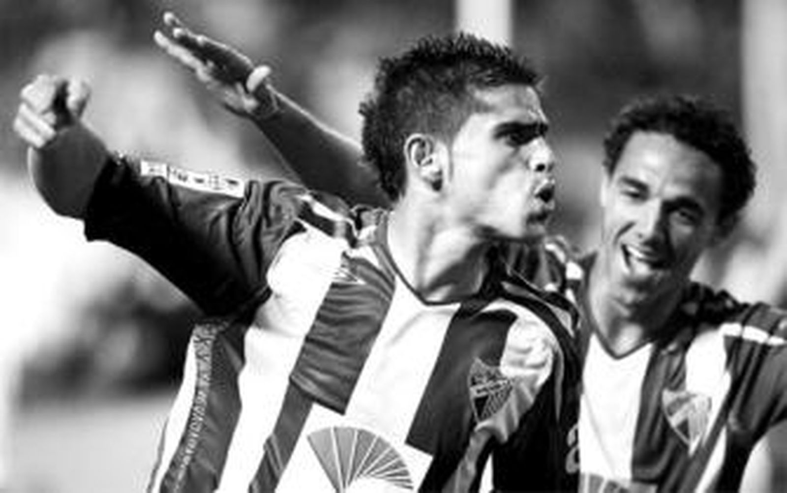 Antonio Hidalgo y Weligton celebran el gol del catalán ante el Racing de Ferrol.