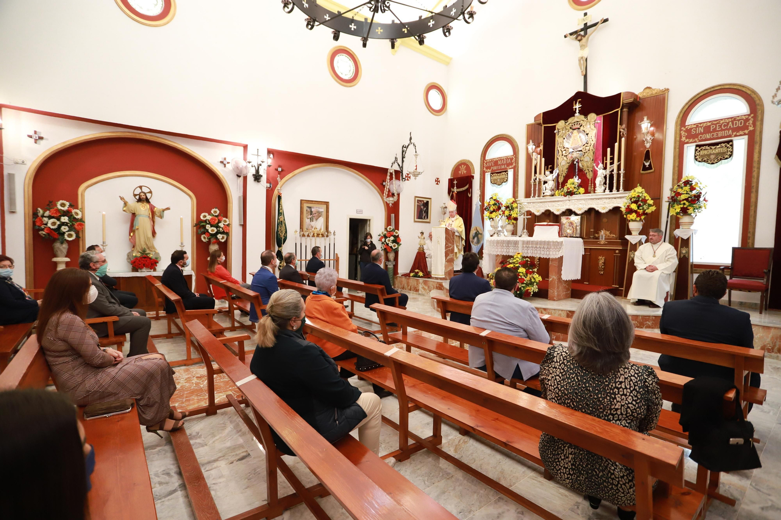 Imágenes de la función principal de Emigrantes, presidida por el obispo de Huelva, José Viaplana Blasco