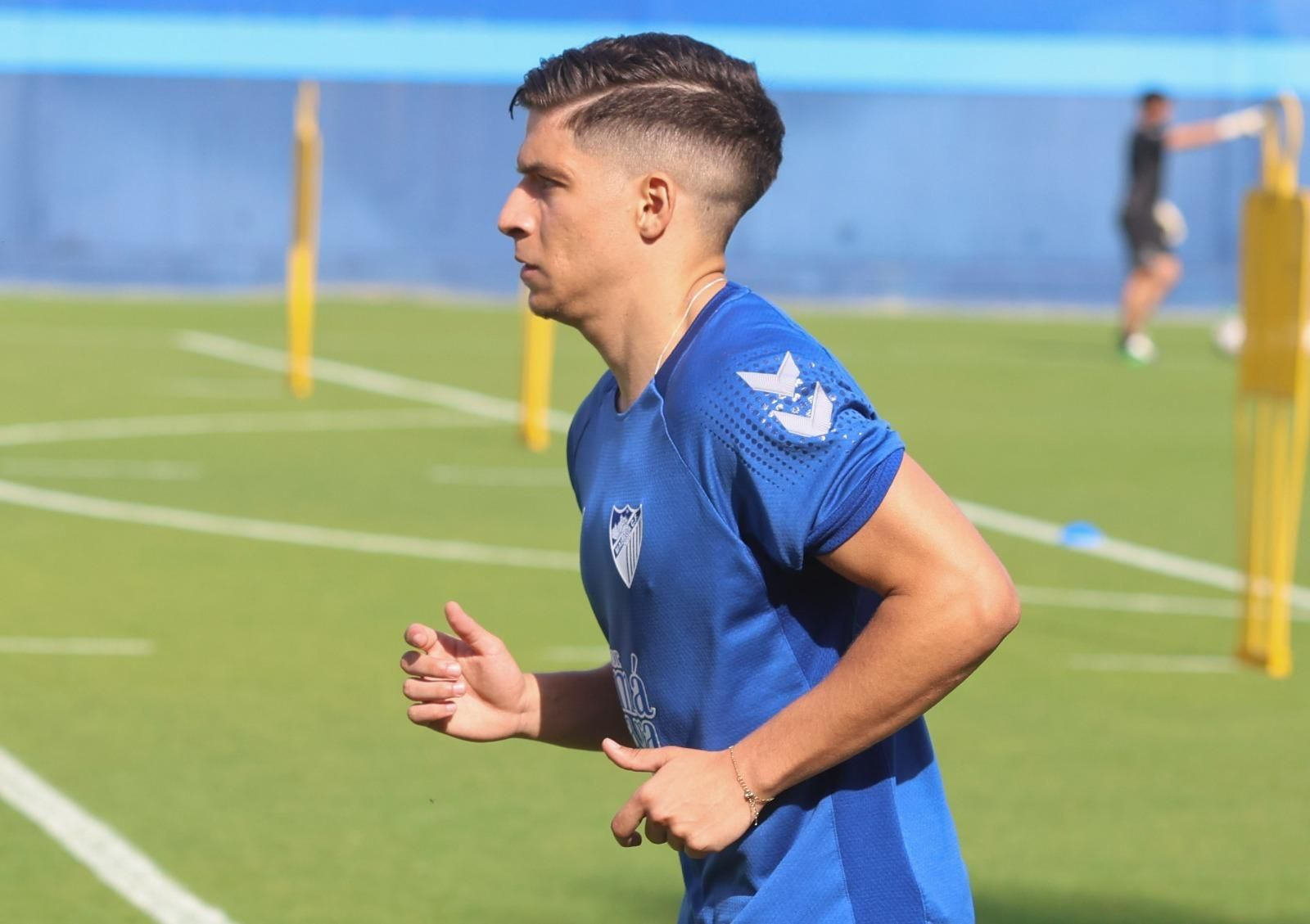 Caras serias en la vuelta al trabajo del Málaga CF