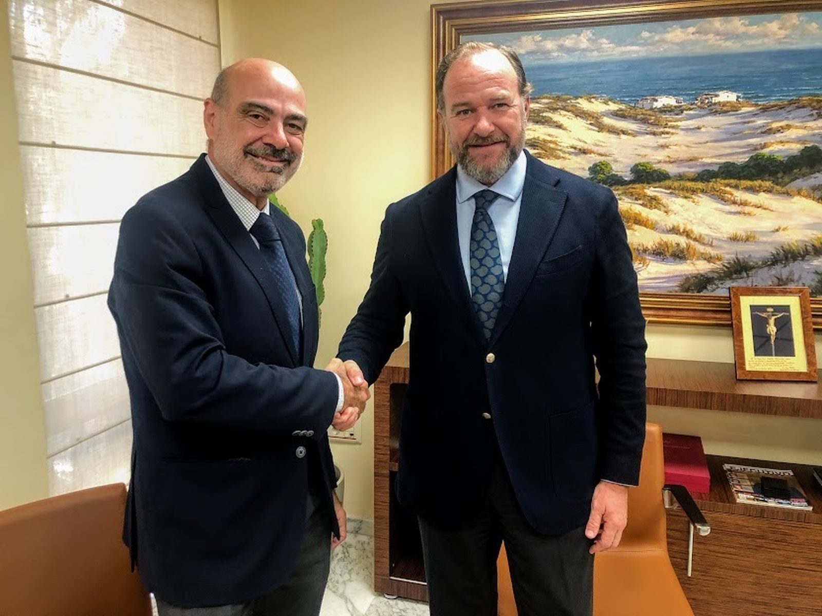 Juan Morales y José Luis García-Palacios tras la firma del convenio.