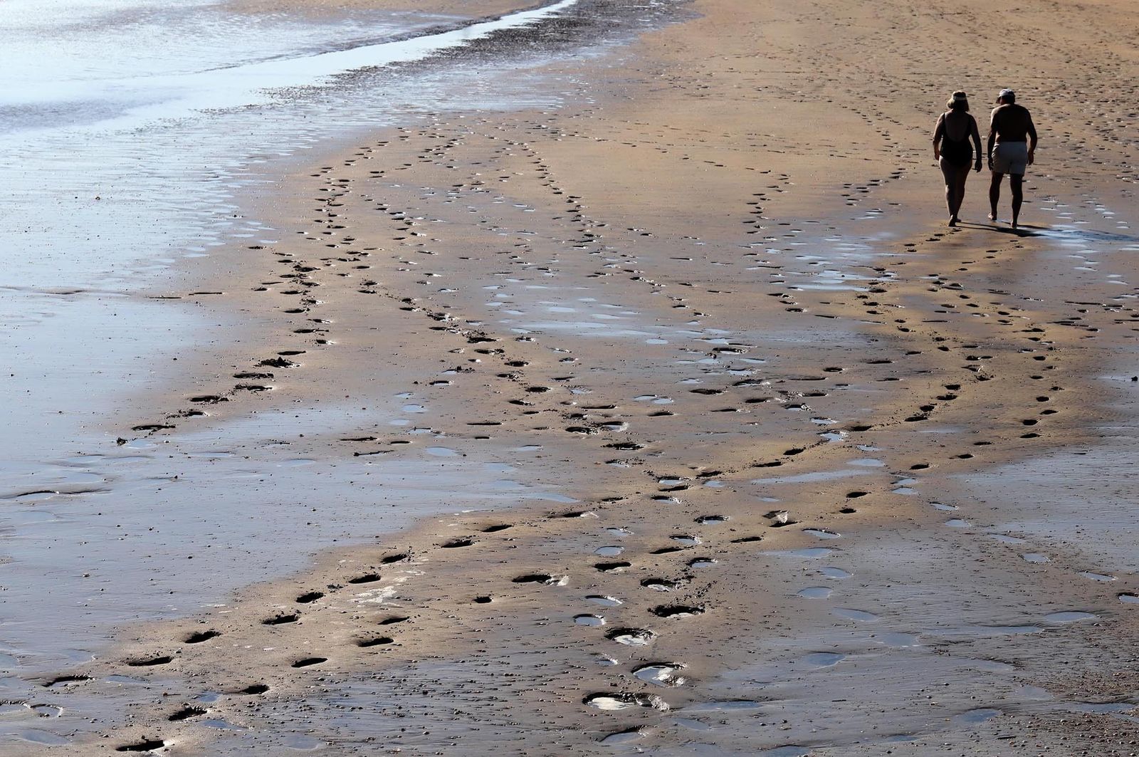 Imágenes del caluroso fin de semana en las playas de Huelva