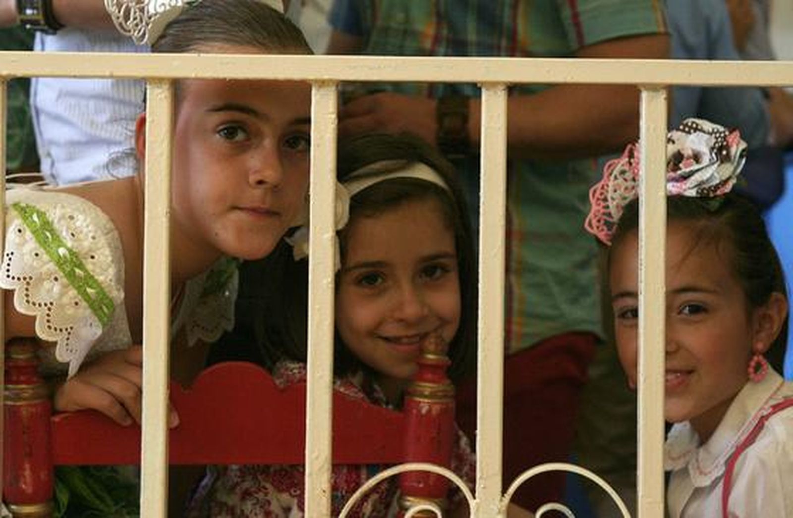 Tres simpáticas niñas tras un enrejado.

Foto: Vanessa Perez