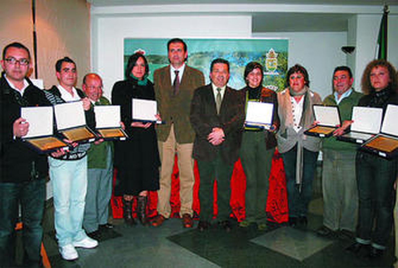 Imagen con los galardonados con los premios de fotografía.