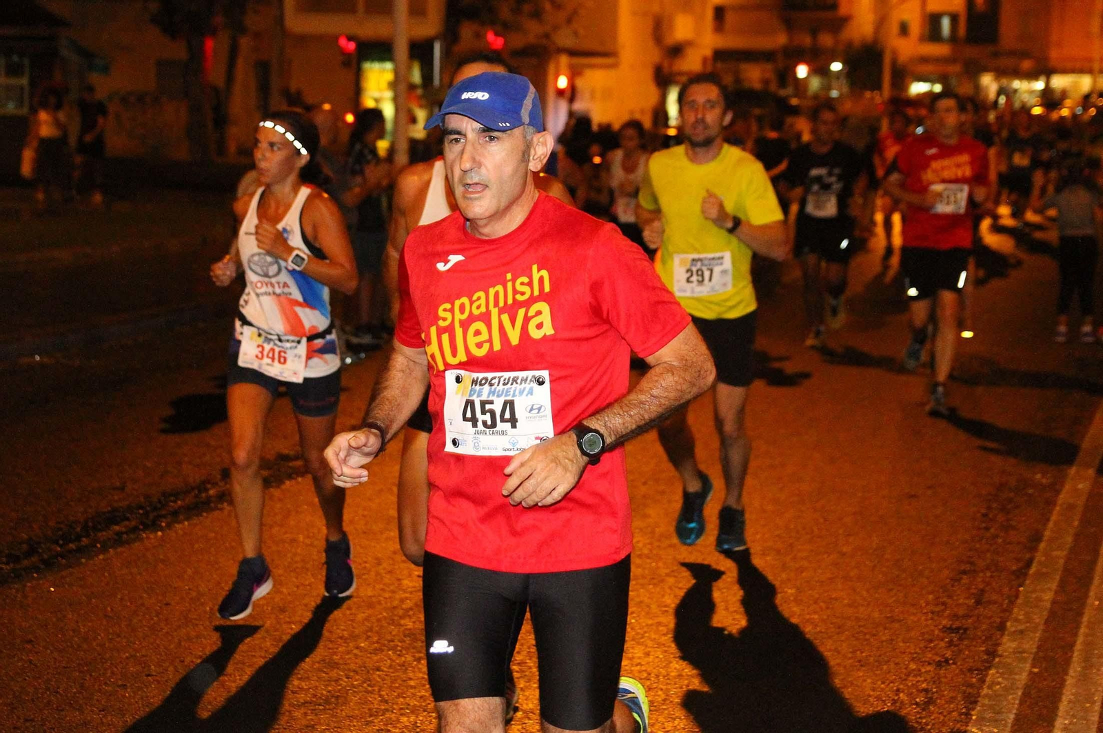 La VII Carrera Nocturna de Huelva en imágenes