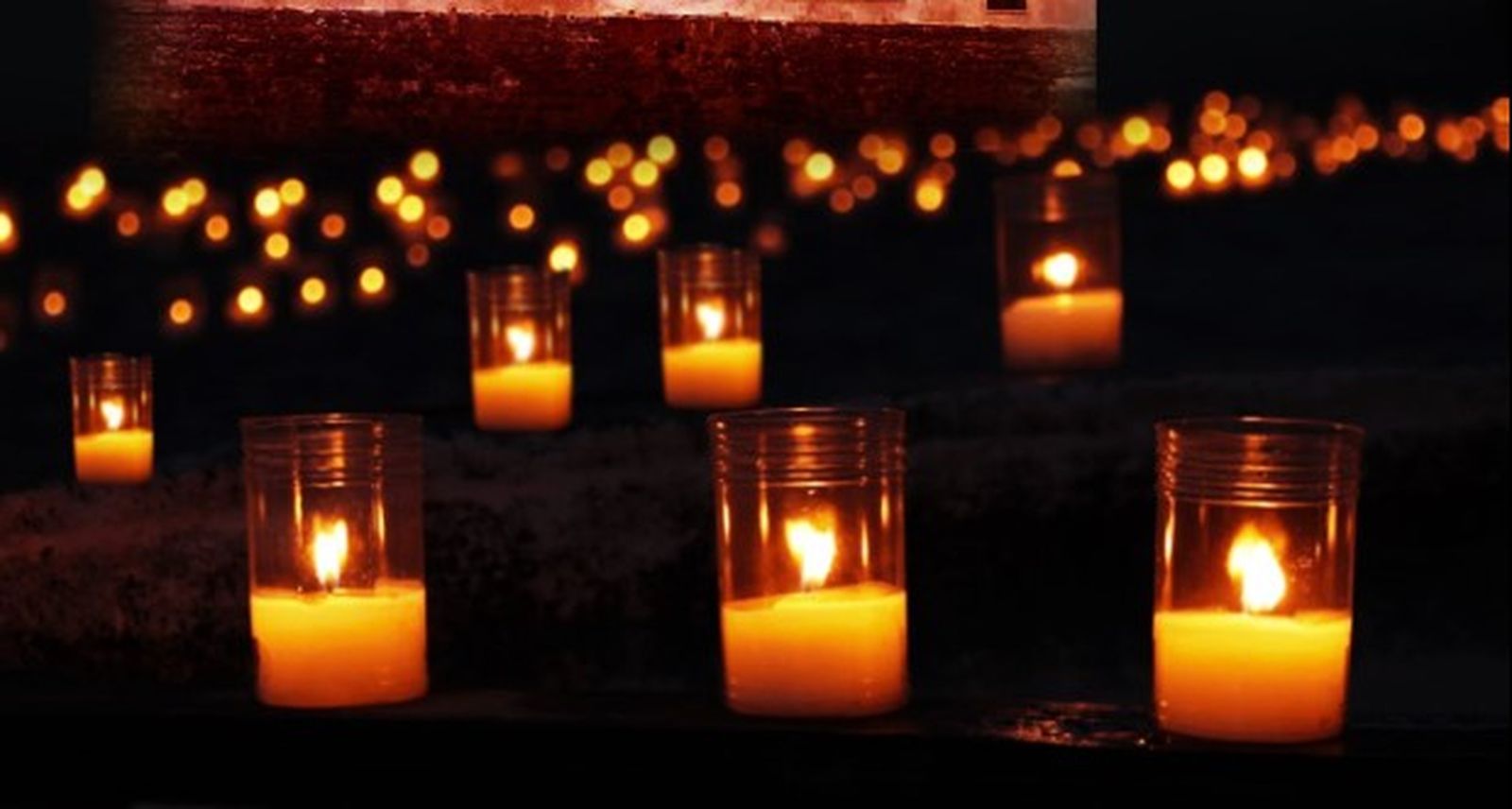 Detalle del cartel de la Noche Iluminada de las Velas 2022, de Chipiona.