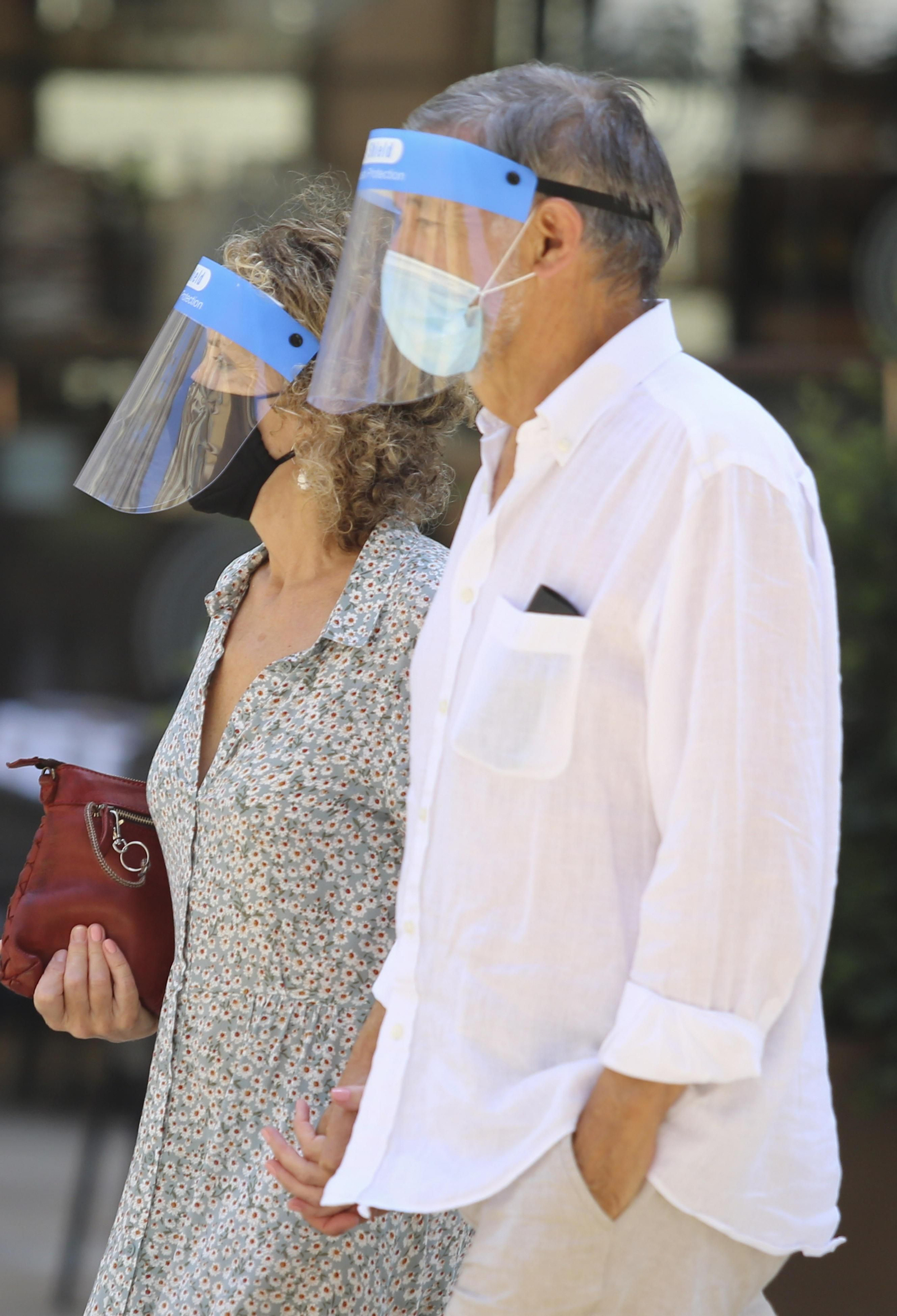 Fotos del primer día de mascarillas obligatorias en las playas y el Centro de Málaga