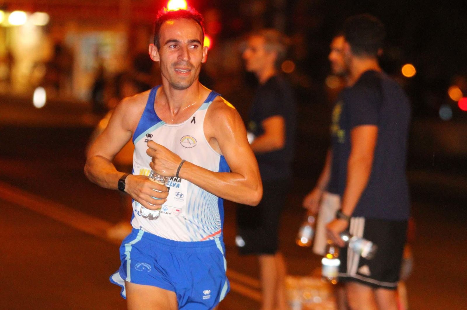 La VII Carrera Nocturna de Huelva en imágenes