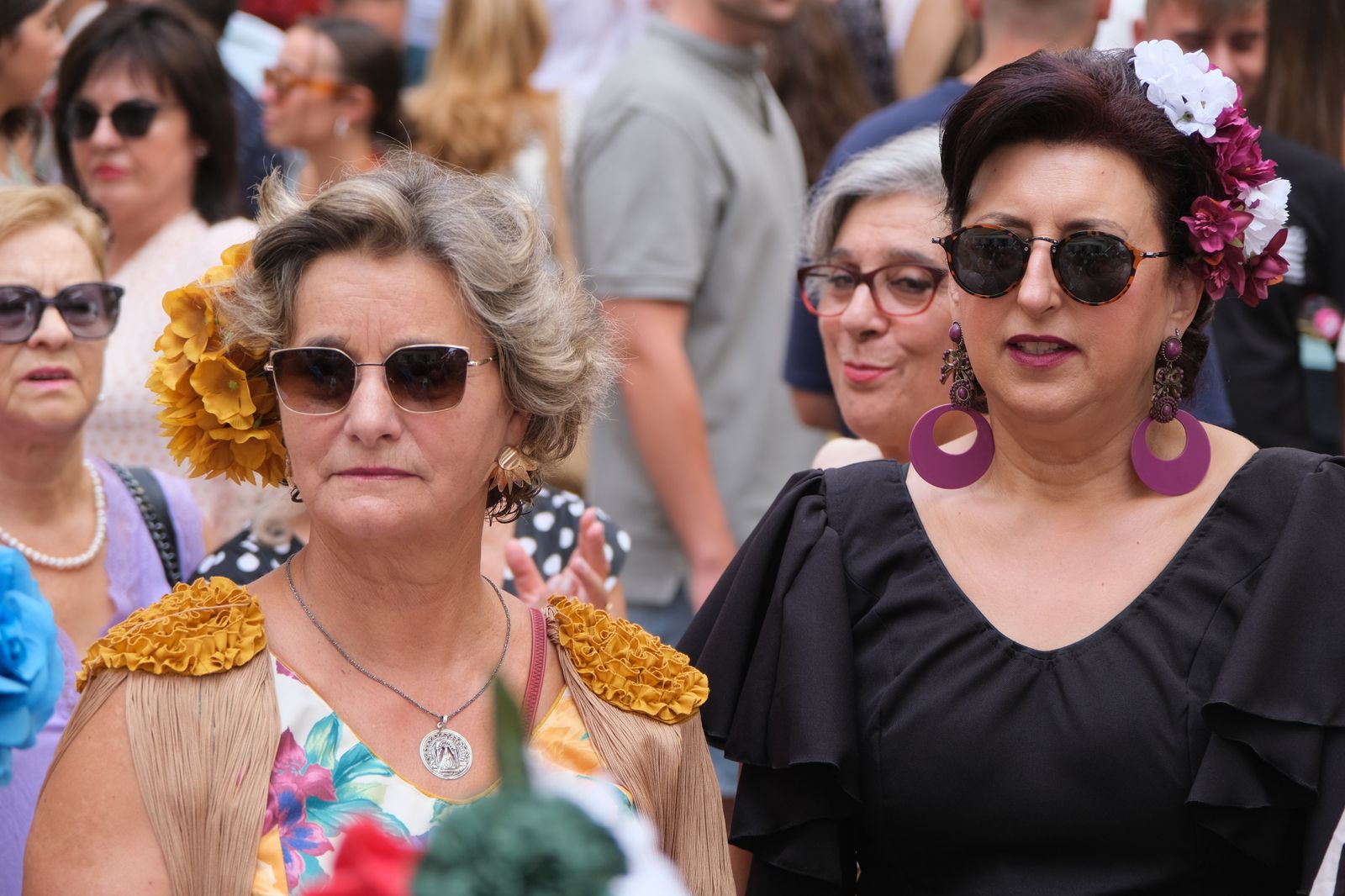 La celebración en Cabra del Día de la Mujer con motivo de la Real Feria, en imágenes