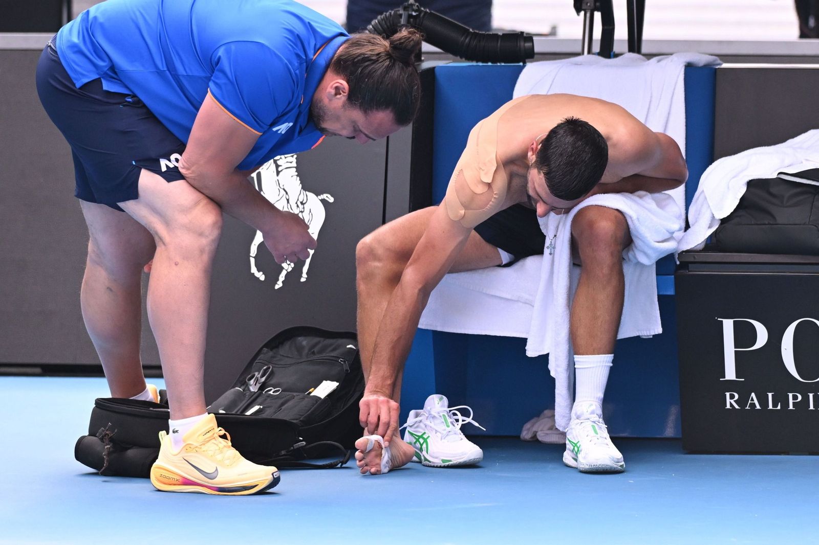 Las fotos de la retirada de Musetti ante Djokovic y del resto de cuartos de final