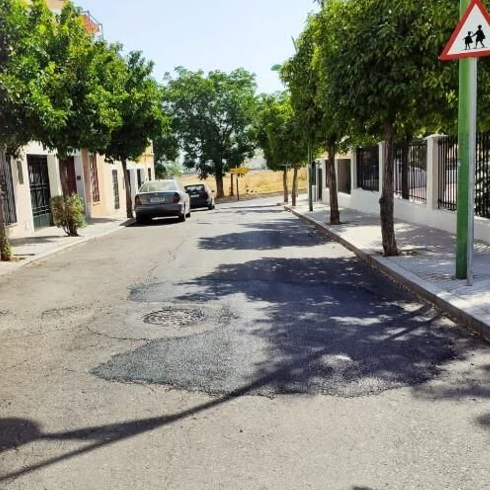 Obras de asfaltado en la calle Hixén I
