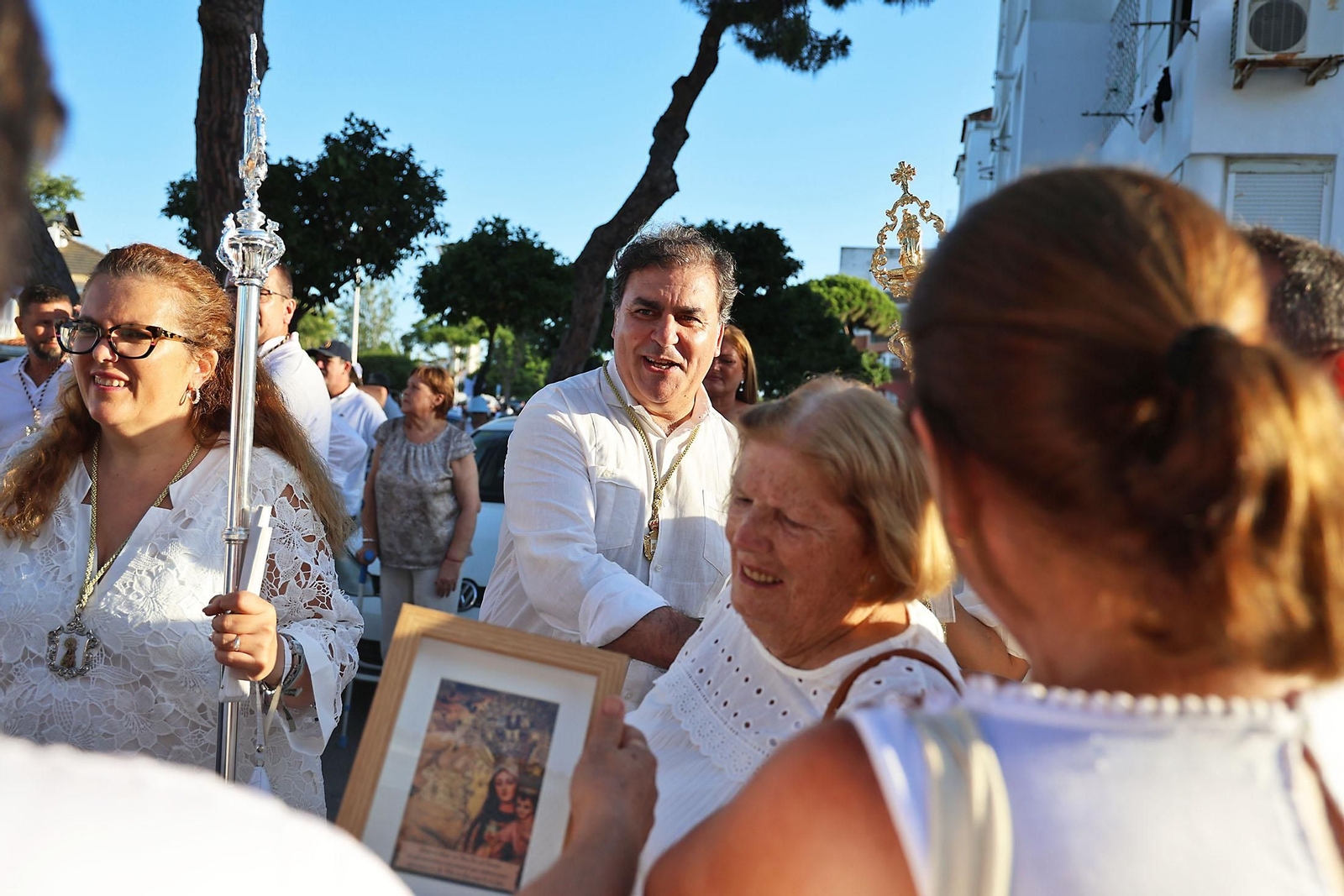 Imágenes de la Virgen del Carmen procesionando en Punta Umbría