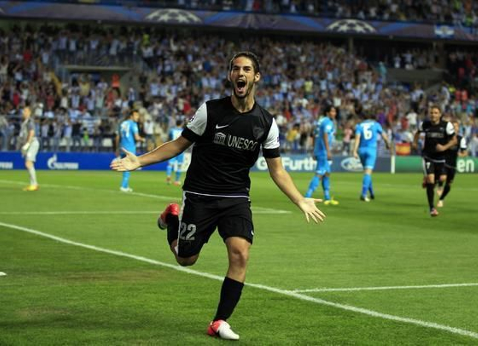 El estreno soñado del Málaga en la Champions, en fotos 

Foto: EFE