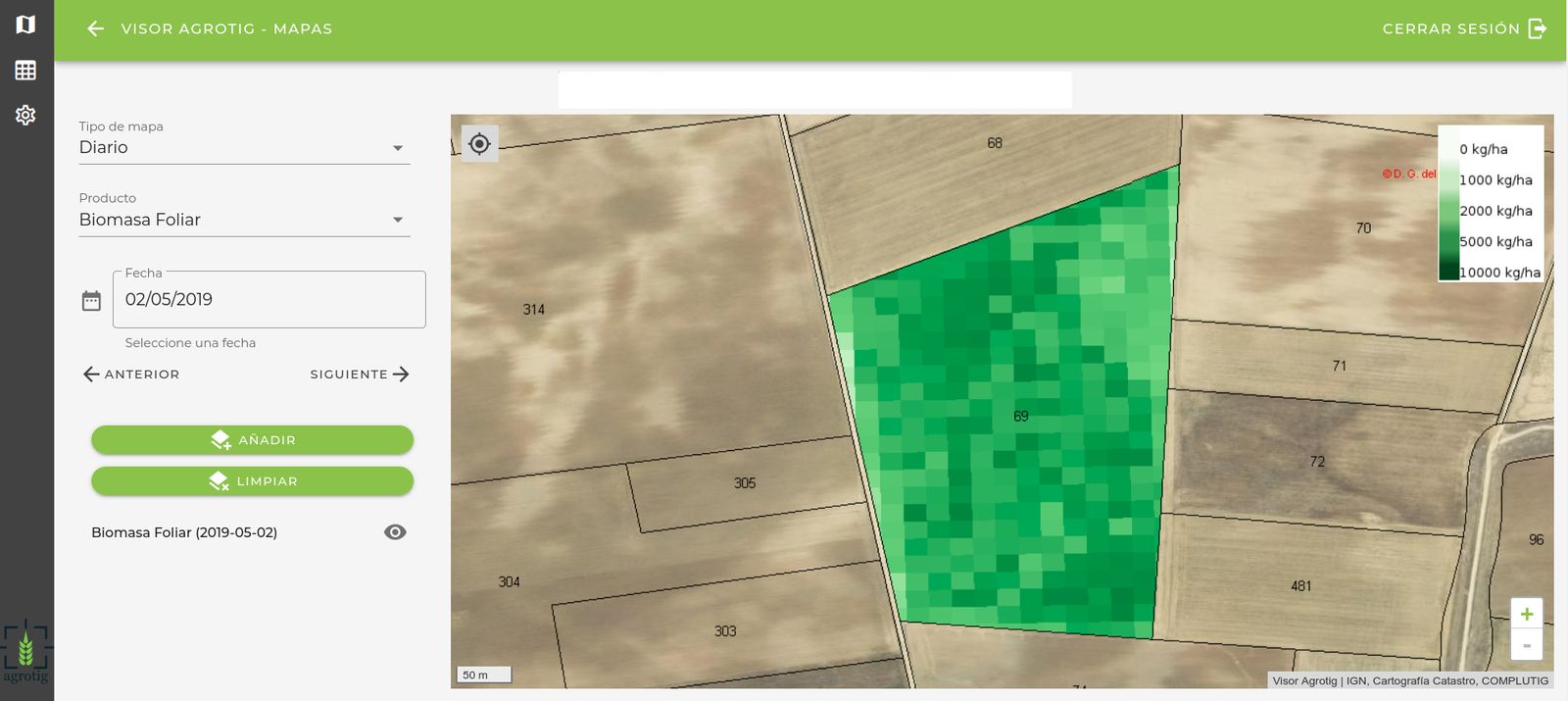 Imagen de un campo de cultivo, obtenida desde un satélite, en la que se aprecian distintos colores de las parcelas.