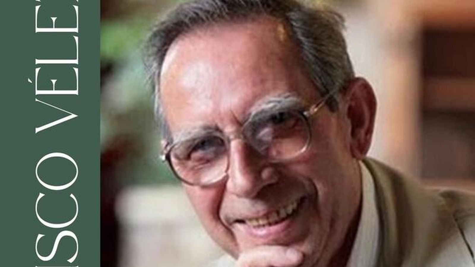 Un cartel anuncia el homenaje al poeta.