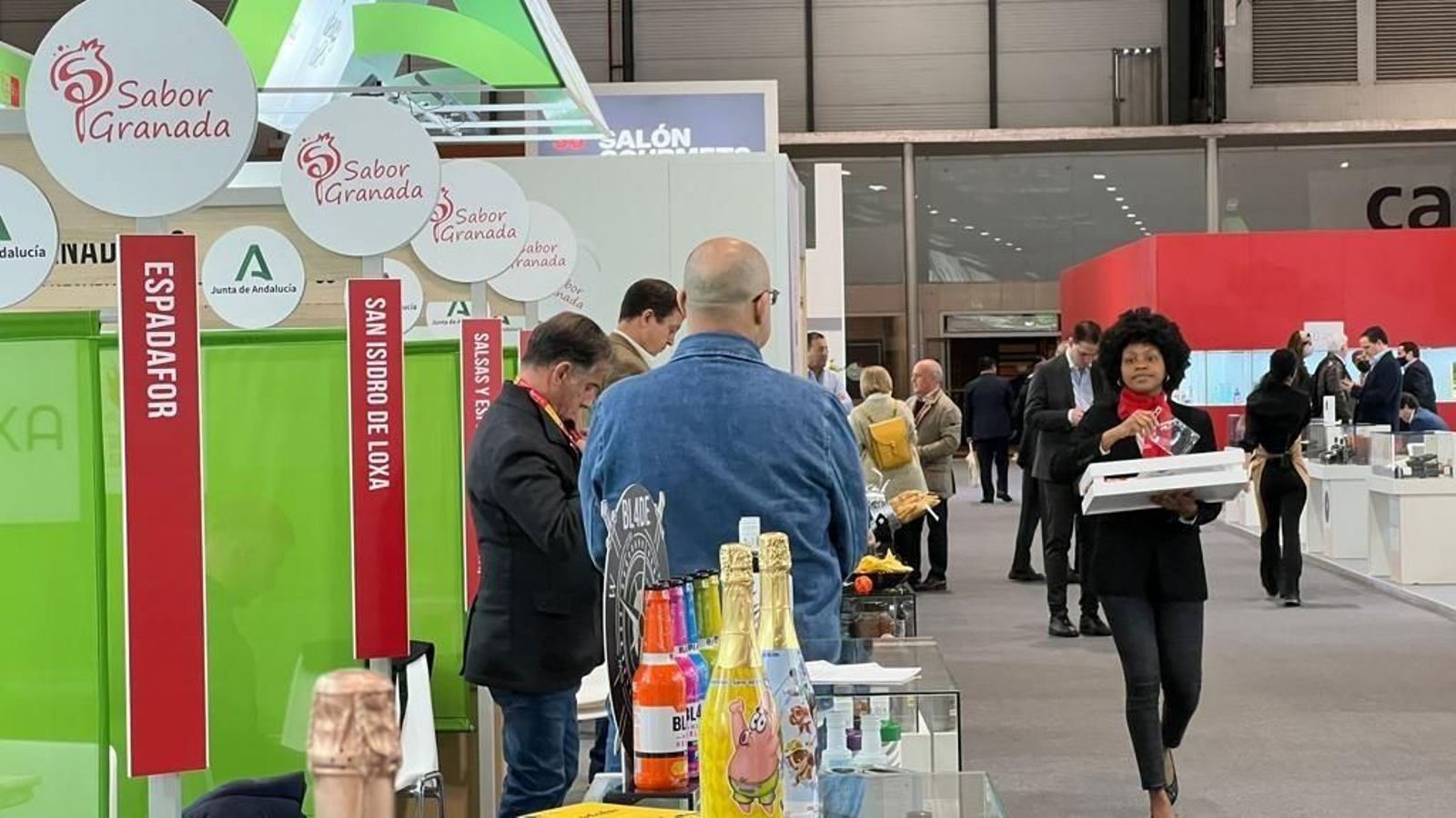 Varias de las empresas de Sabor Granada que se exhiben en el Salón Gourmets de Madrid.