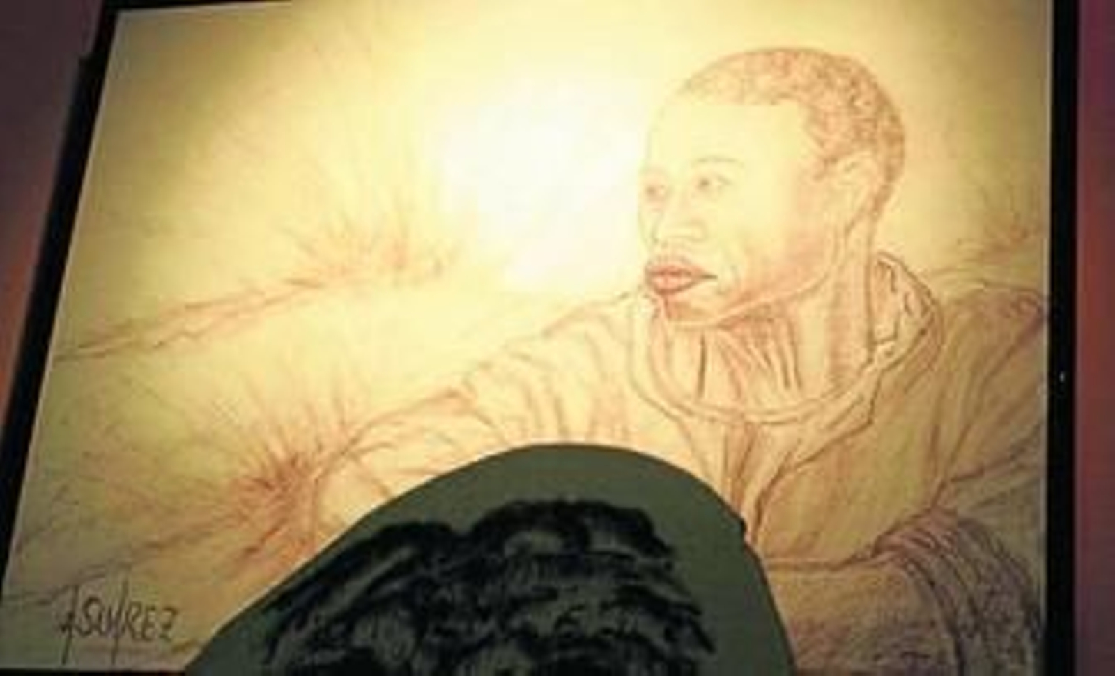 Algunas de las obras expuestas del pintor Antonio Suárez en el restaurante Rocataliata.