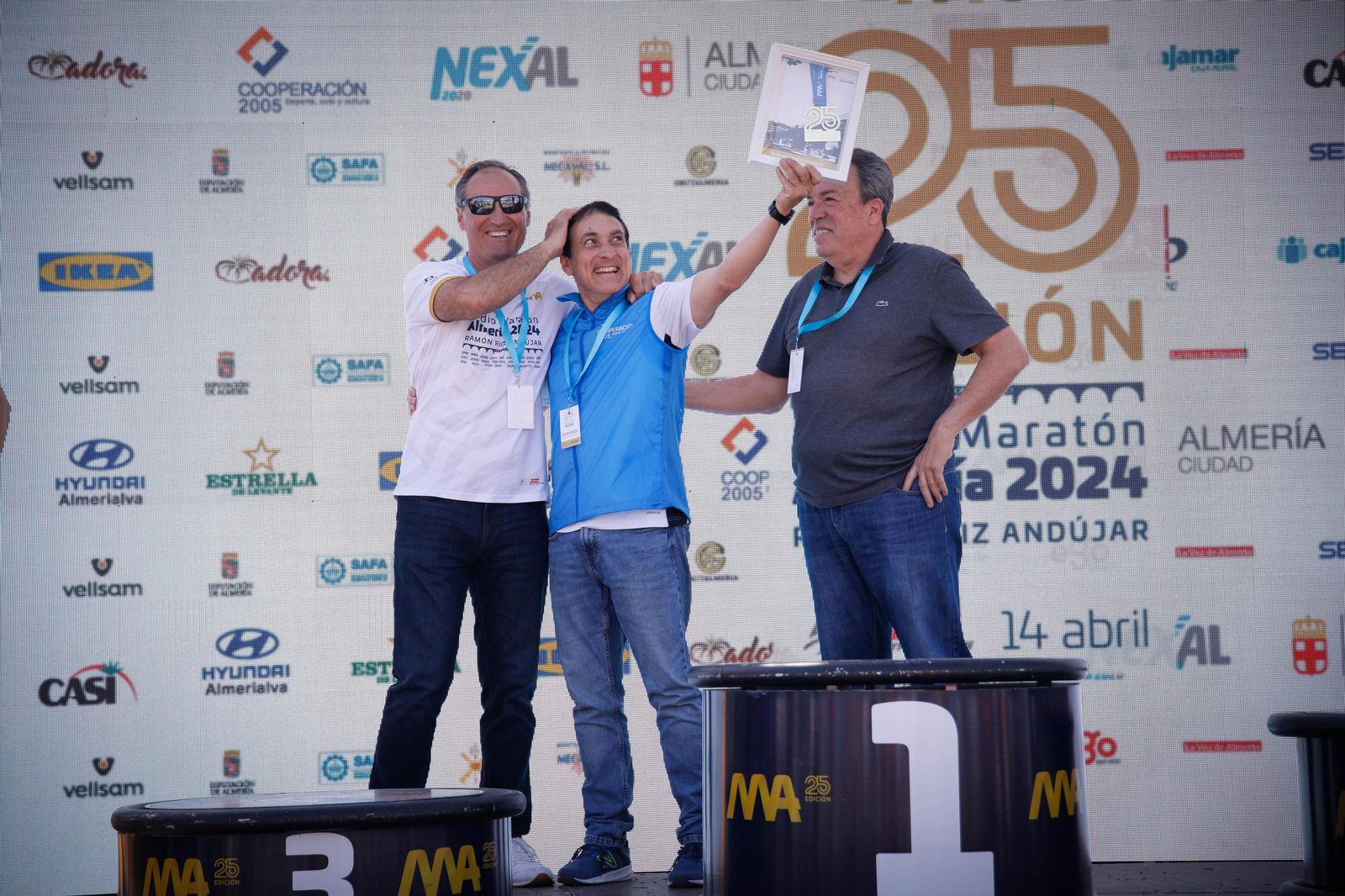 Imágenes de los premiados en la Media maratón de la Cuidad de Almería