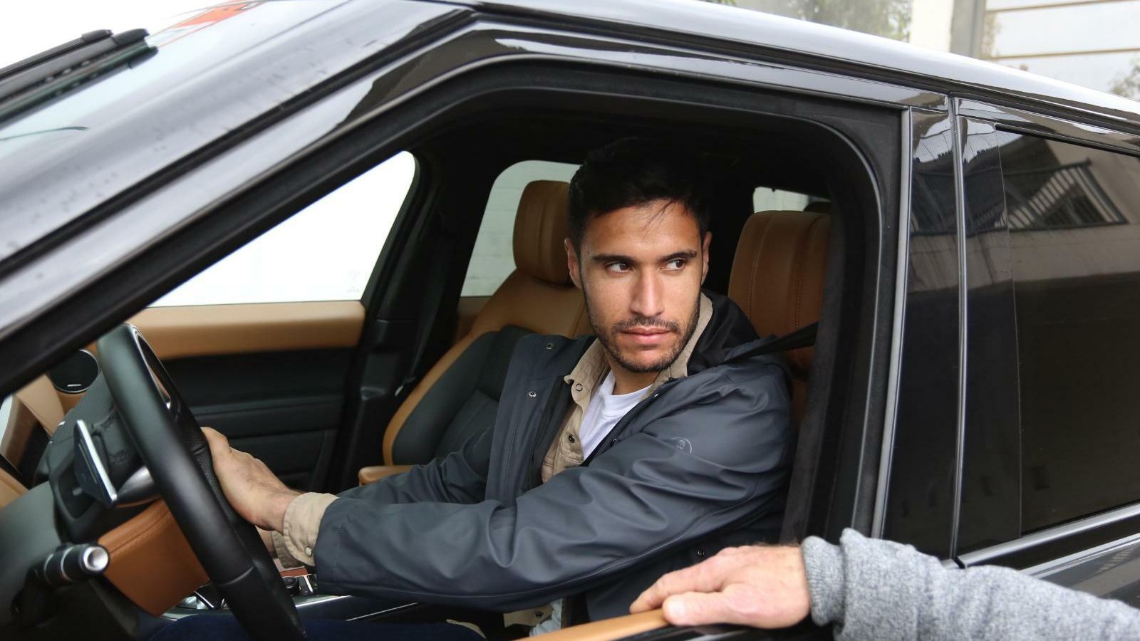 Munir, a la salida de La Rosaleda.