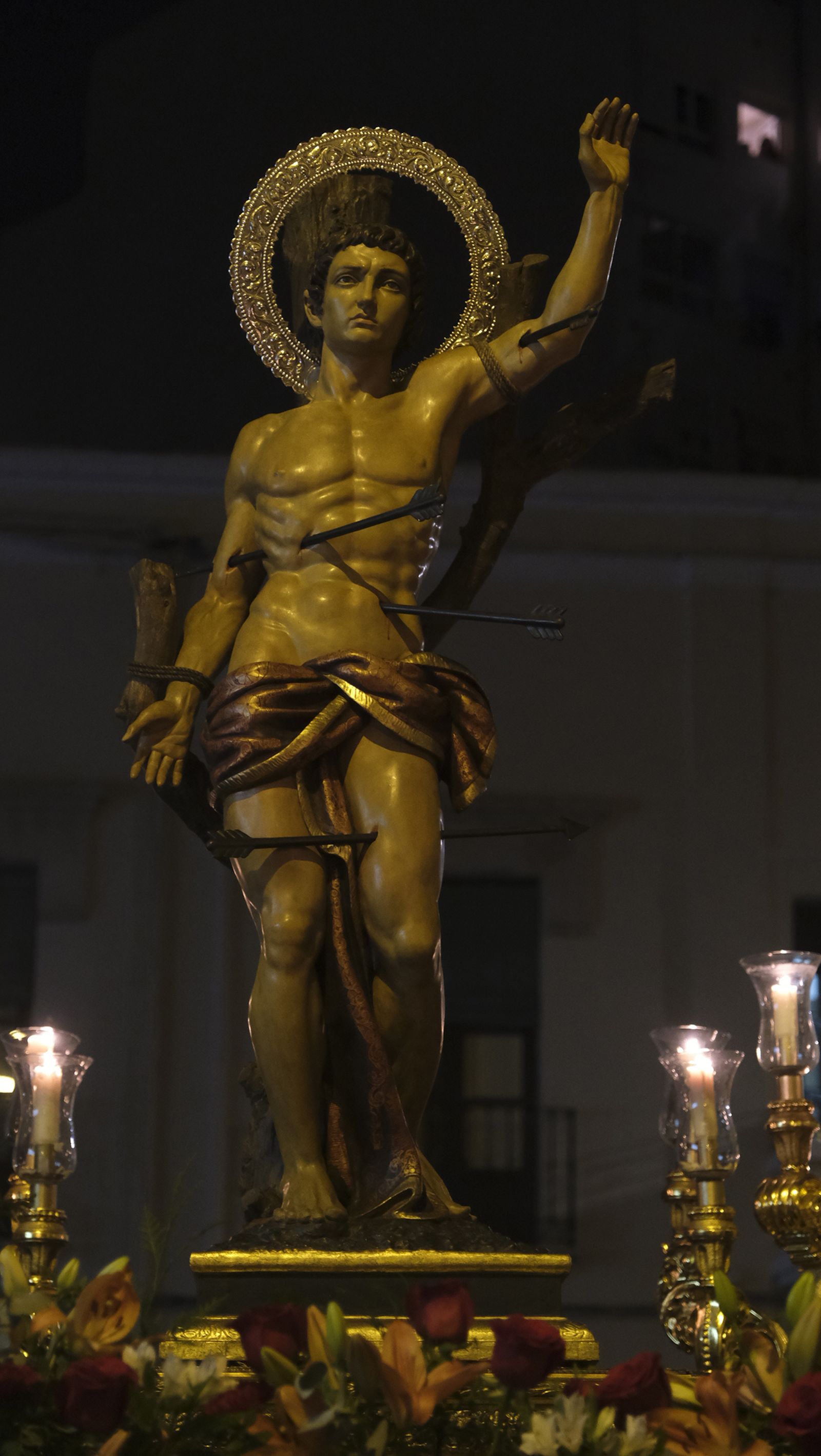 Imágenes de la misa y procesión de San Sebastián, en Almería