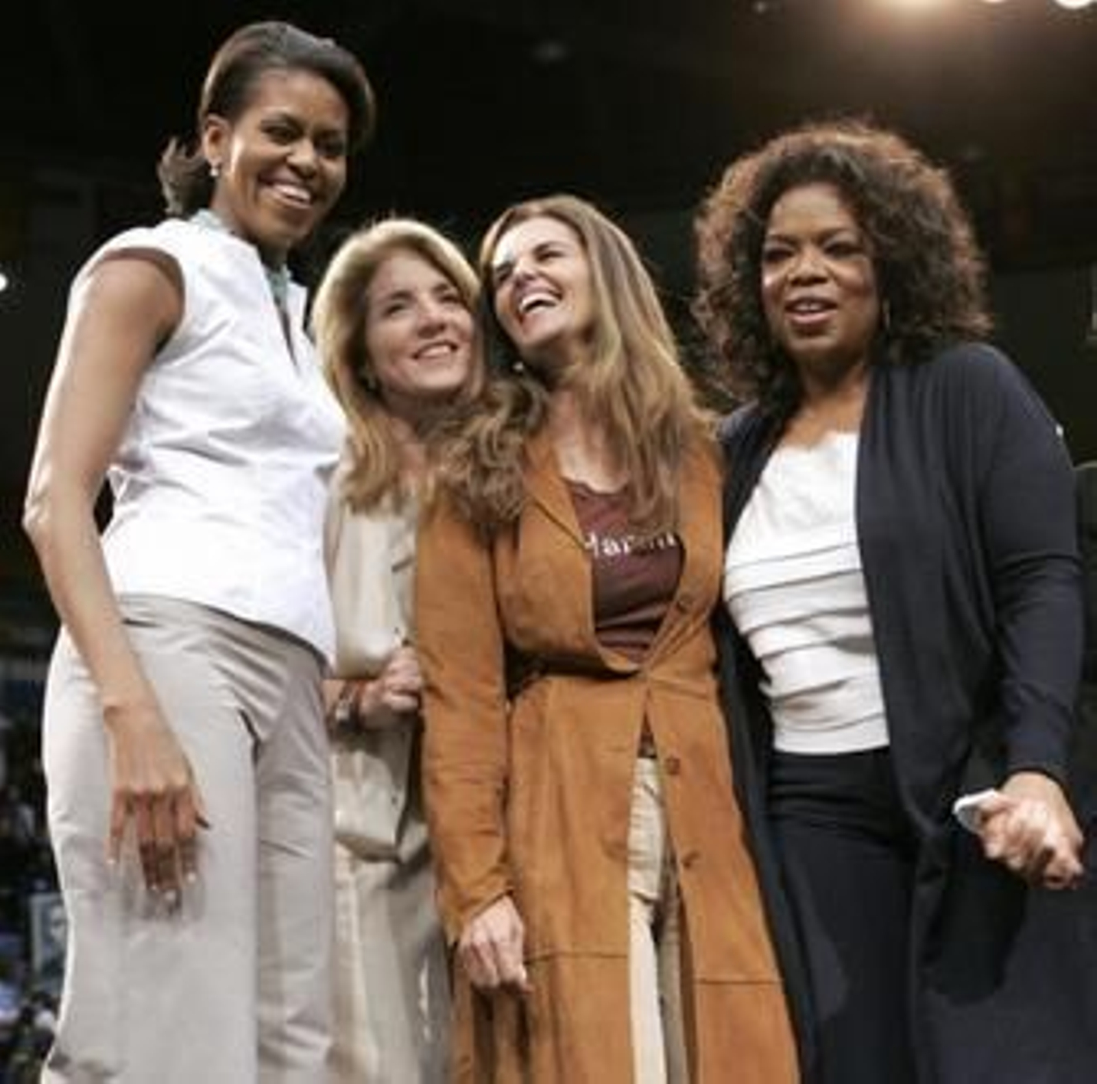 Michelle, Caroline Kennedy, Maria Shriver y Ophra Winfrey, en un acto electoral.