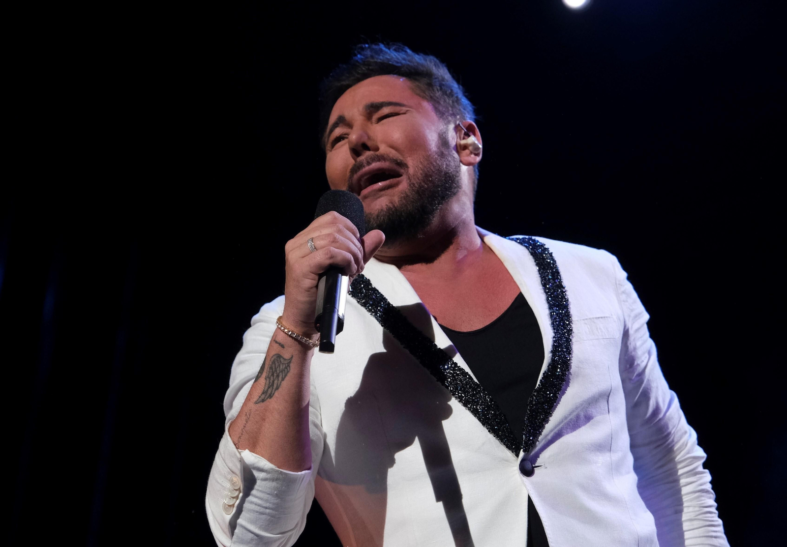 El concierto de Miguel Poveda en la plaza de toros de Córdoba, en fotografías