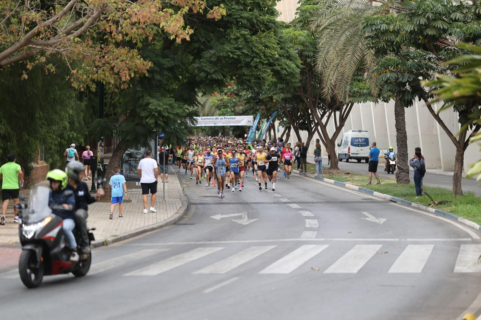 Las fotos de la VIII Carrera de la Prensa y la IV Marcha Solidaria de Málaga