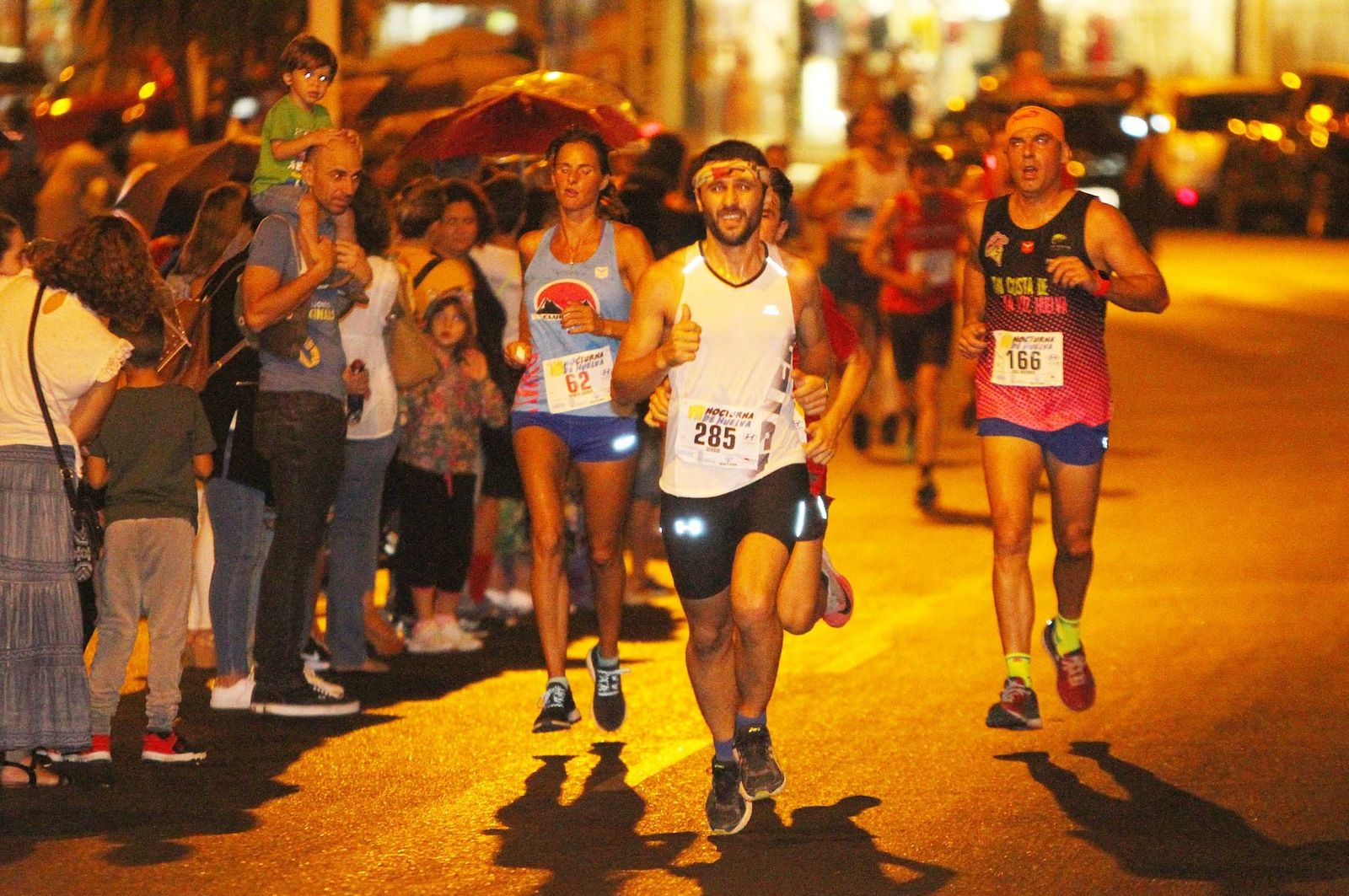 La VII Carrera Nocturna de Huelva en imágenes