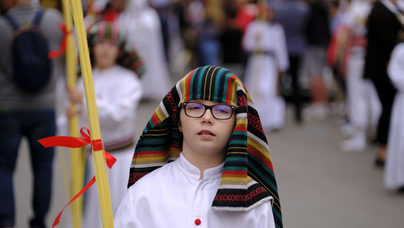 La Borriquita procesiona por las calles de Almería, en imágenes